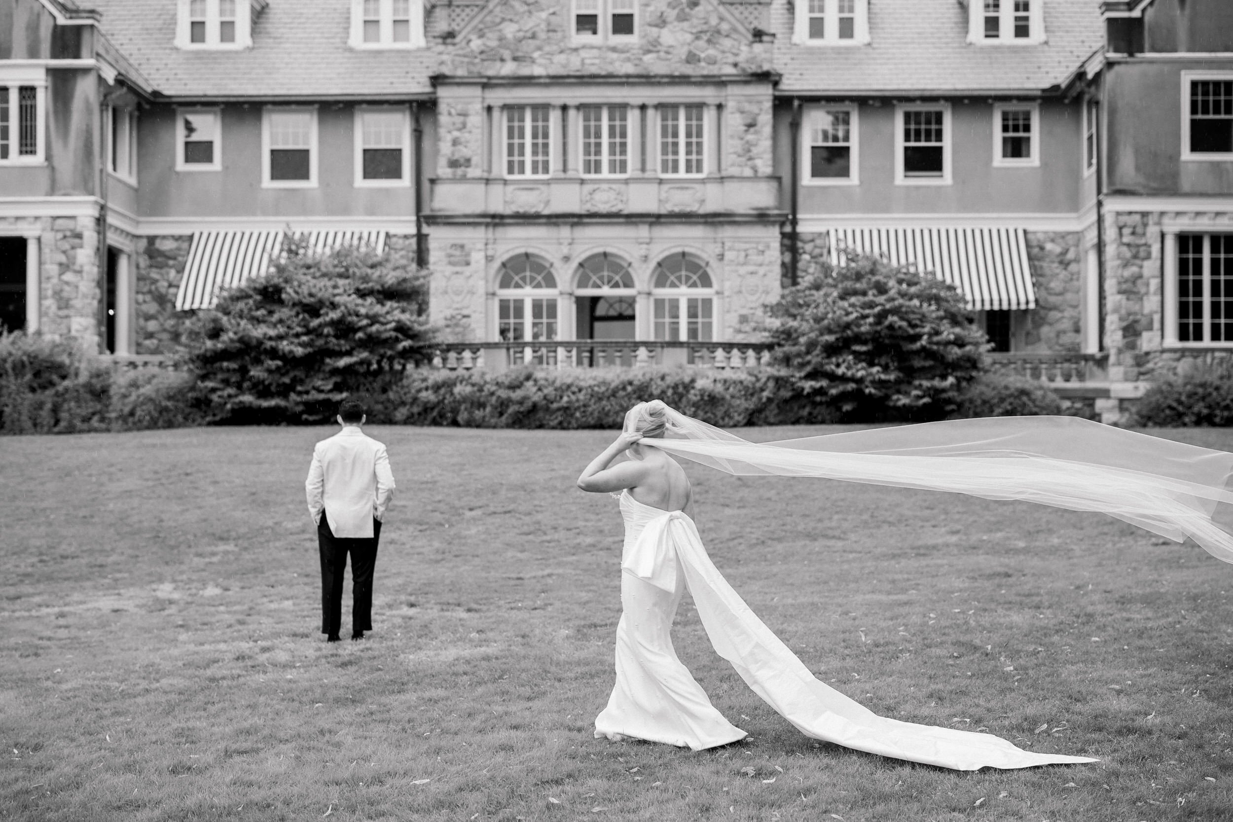 Documentary photograph of a couple's first look before their Blithewold Wedding.