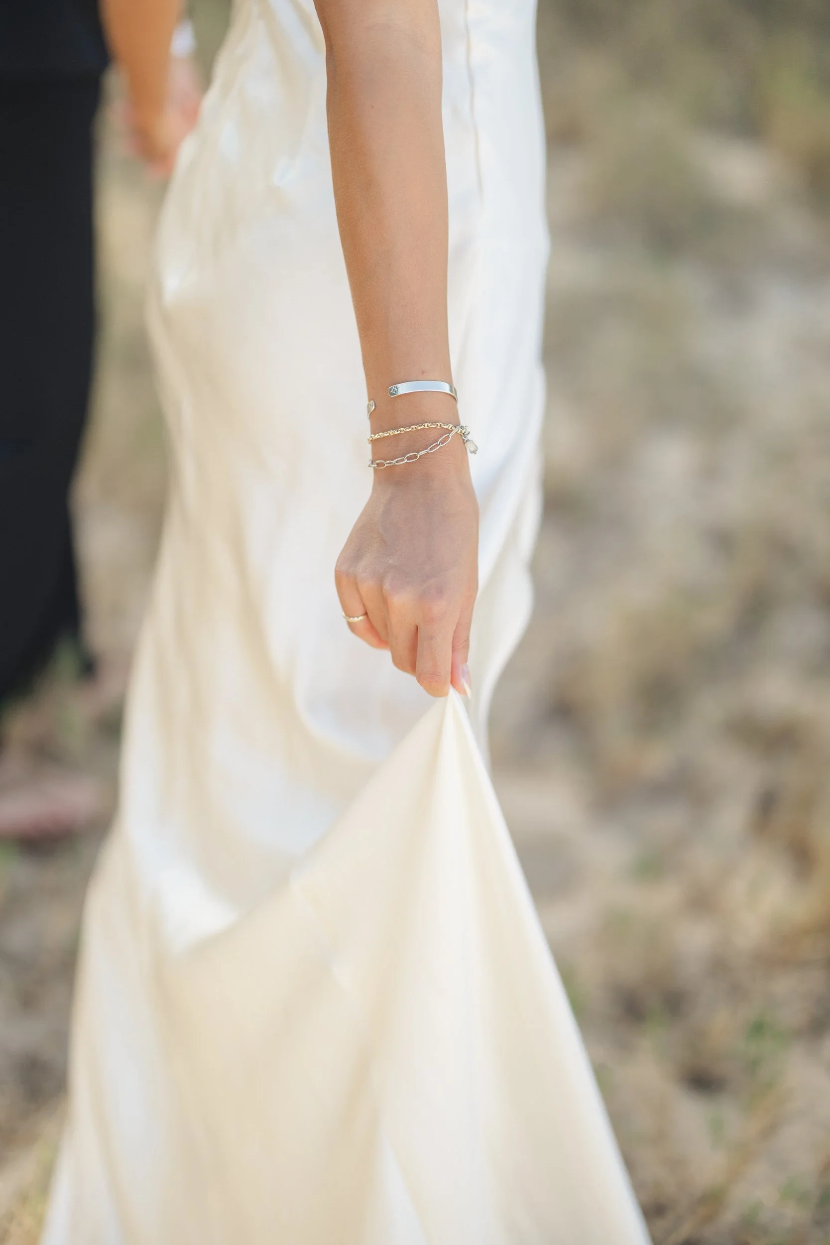 Bride and groom walking together during Oahu sunrise elopement