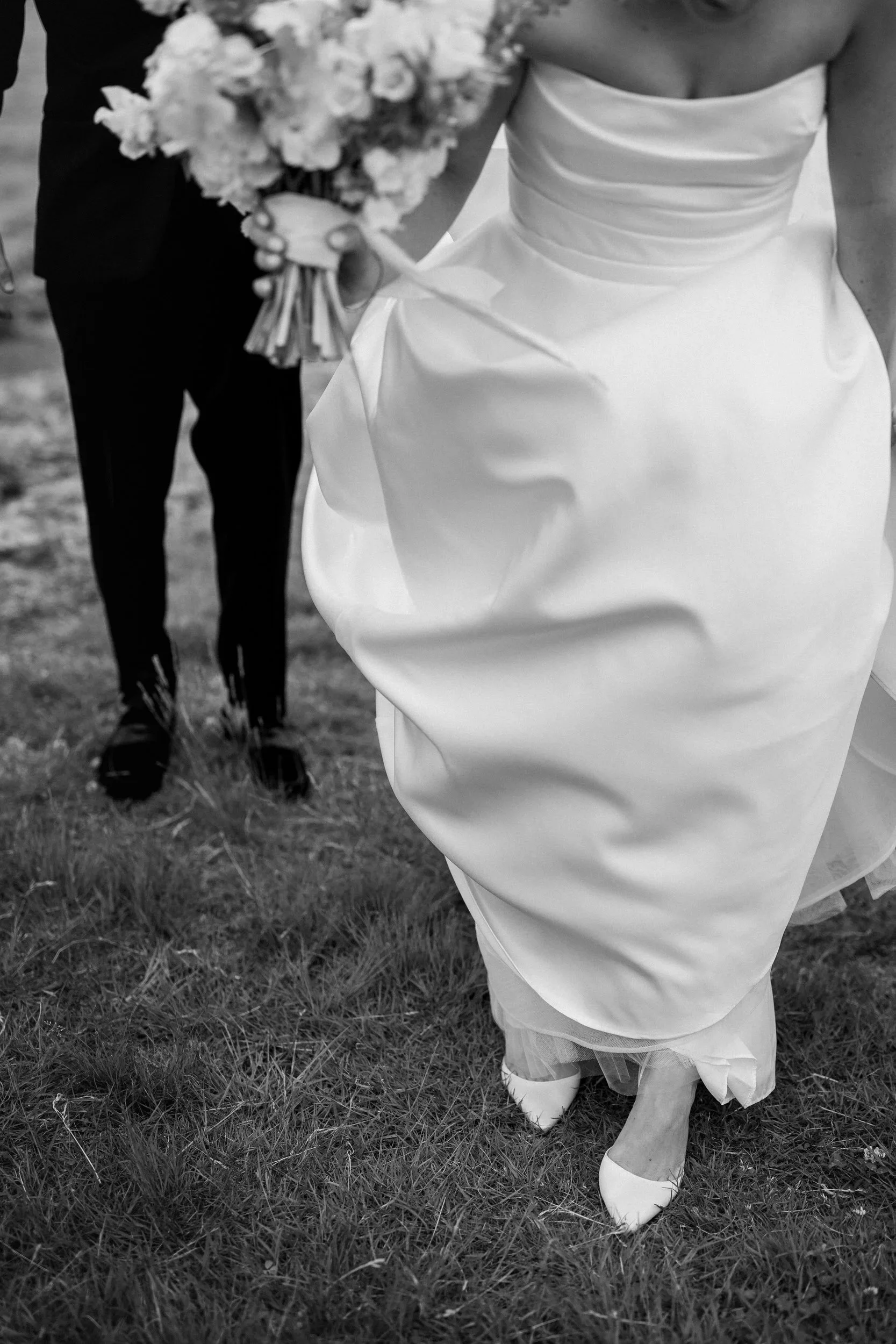 Couple portraits at Chandler Hovey Park overlooking Marblehead Harbor during a North Shore wedding.