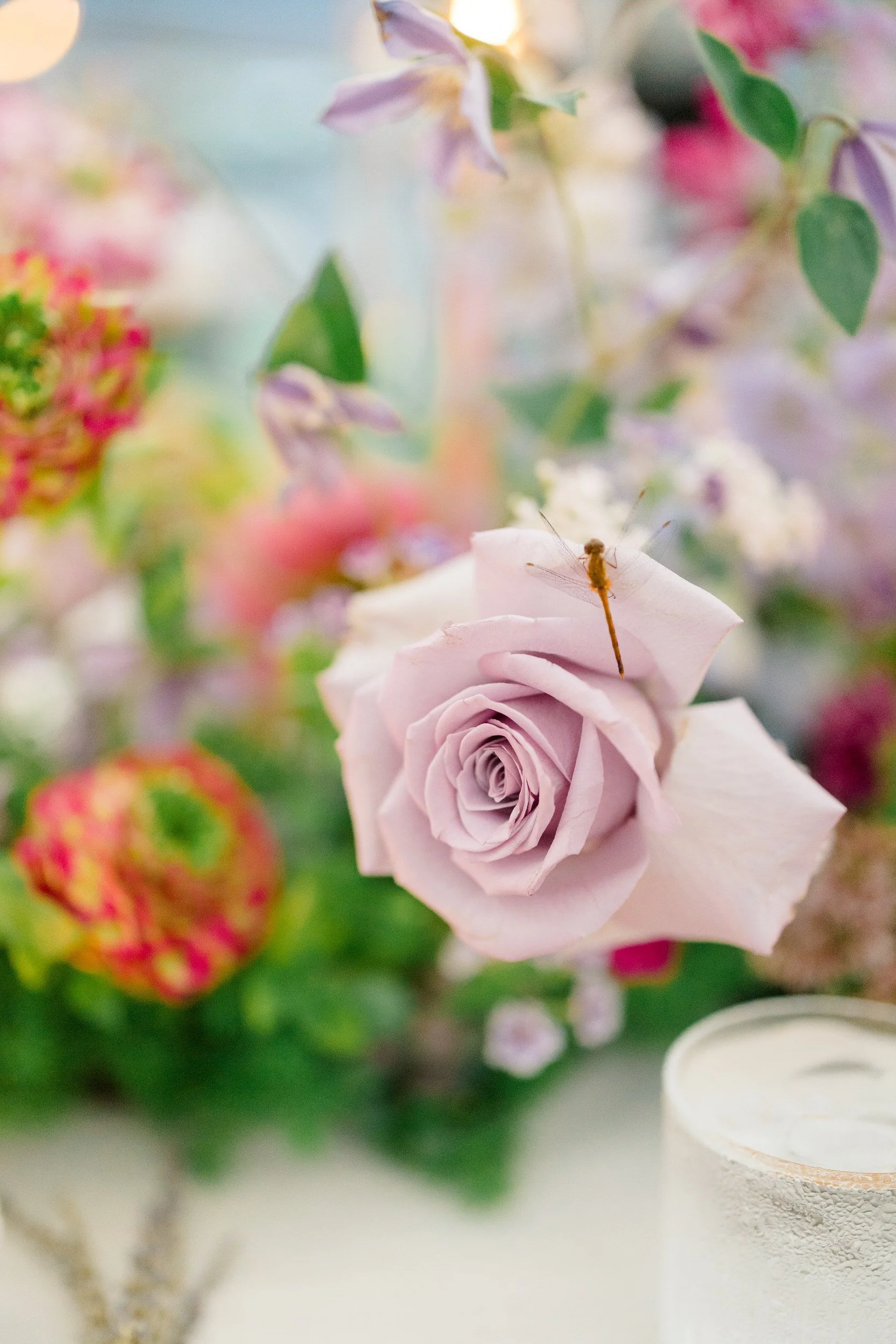 Rifle Paper Co.-inspired reception featuring vibrant floral installations at the Connors Center.