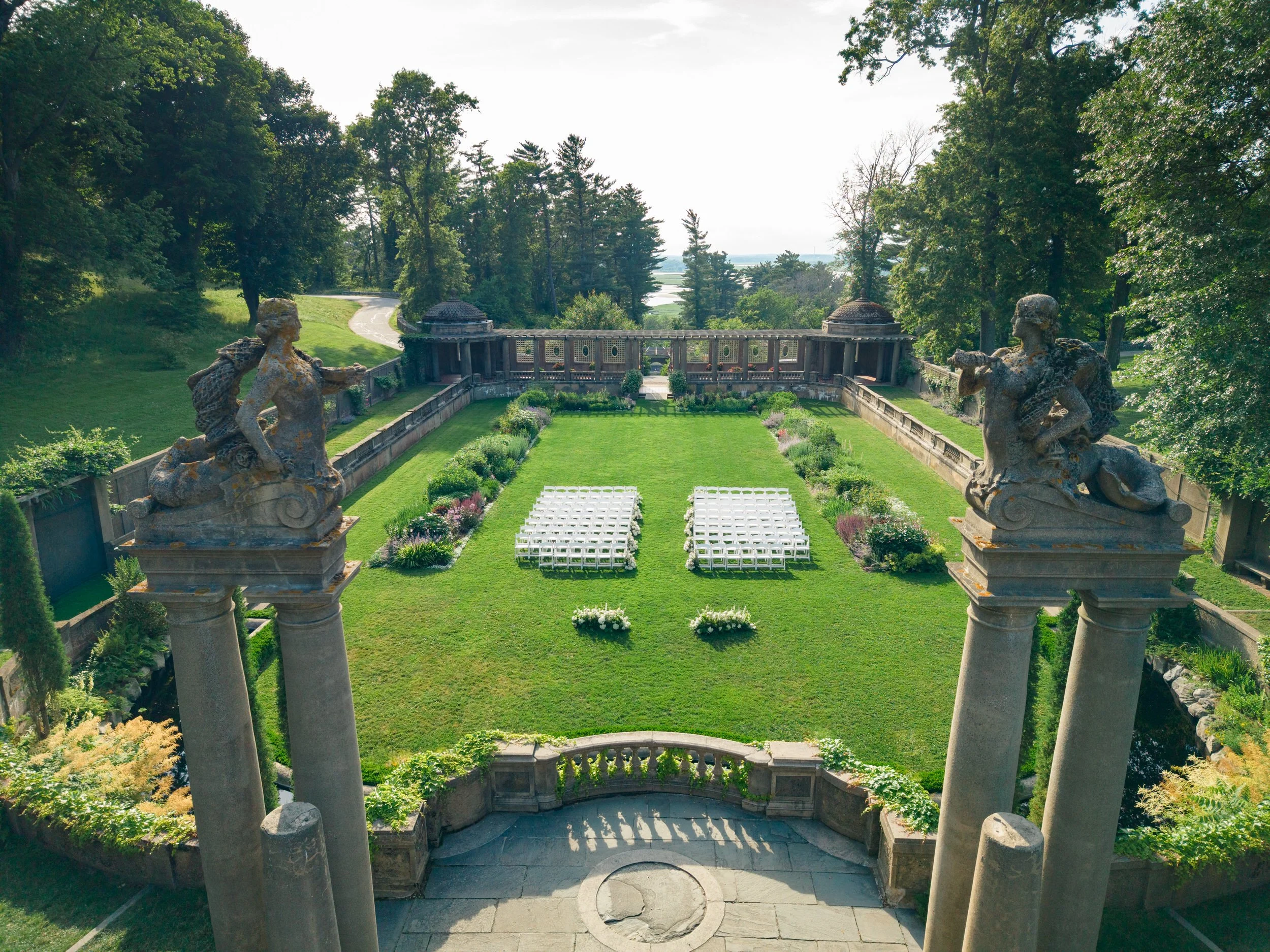 Ceremony details captured from above showing the Italian Garden at Castle Hill on the Crane Estate before guests arrive.