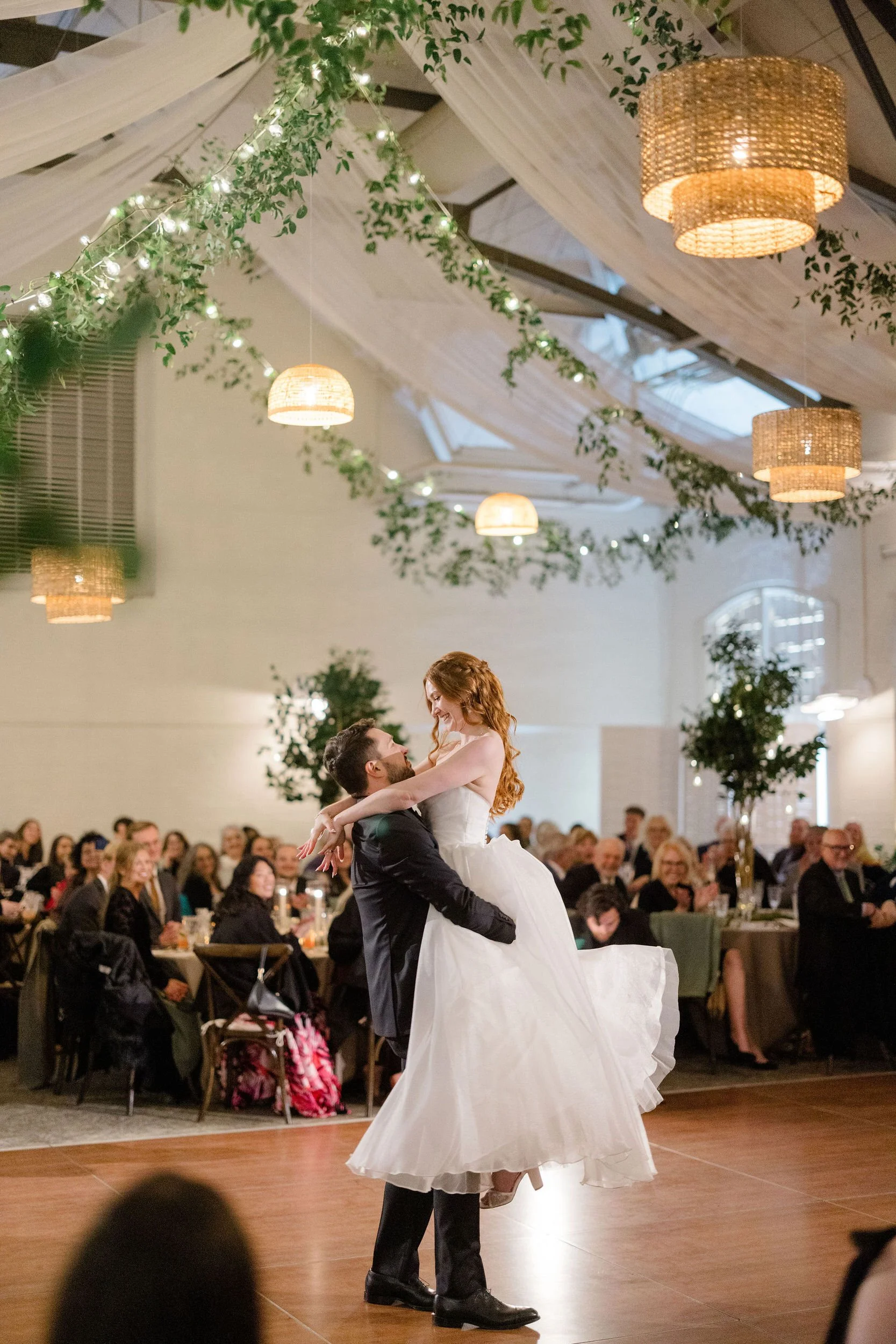 Wedding reception at Elm Bank in Wellesley, Massachusetts, with guests celebrating together.