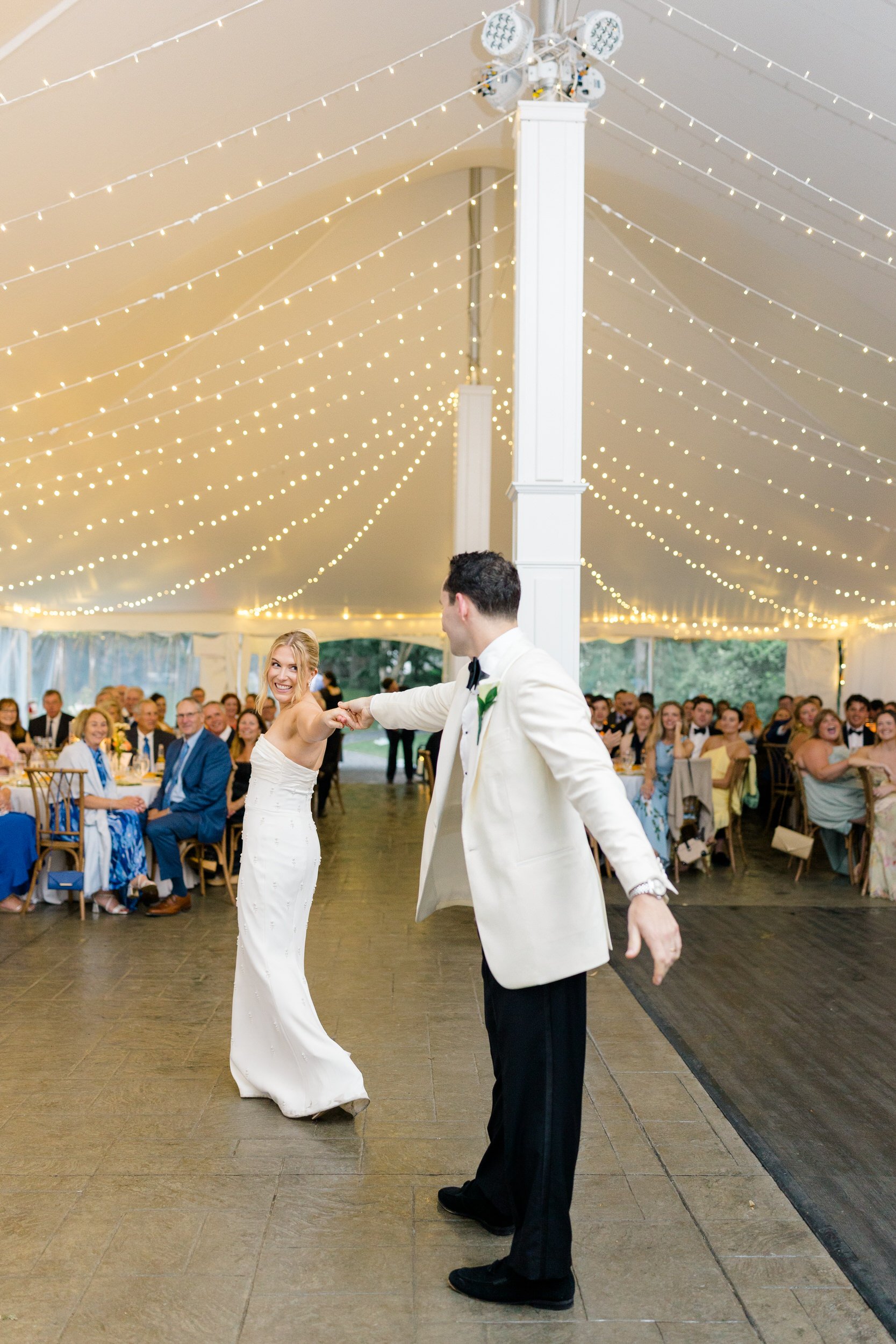 Bride and groom dancing during their reception at Blithewold Mansion.