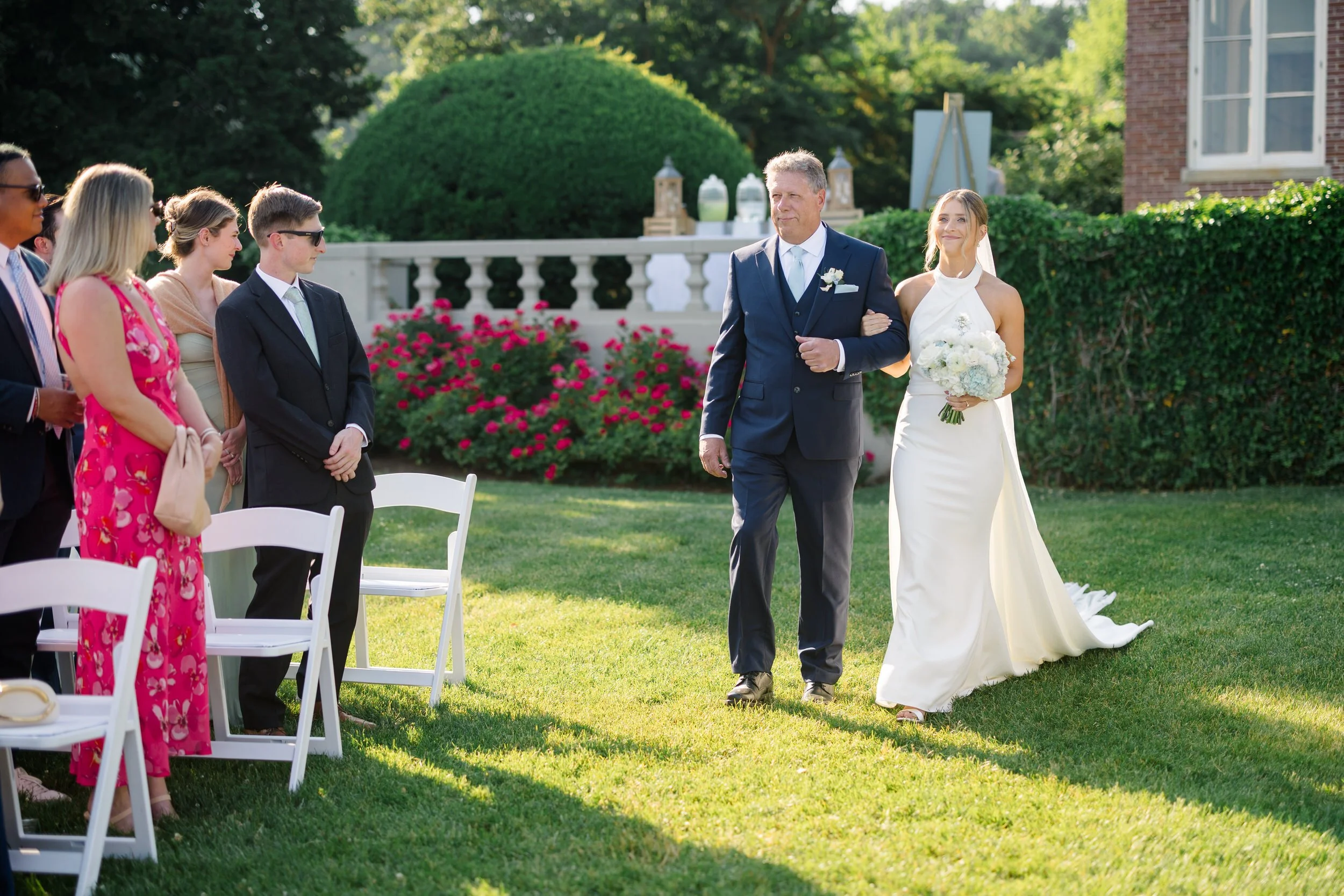 Bride and groom exchanging vows during an outdoor wedding ceremony at Misselwood Estate.