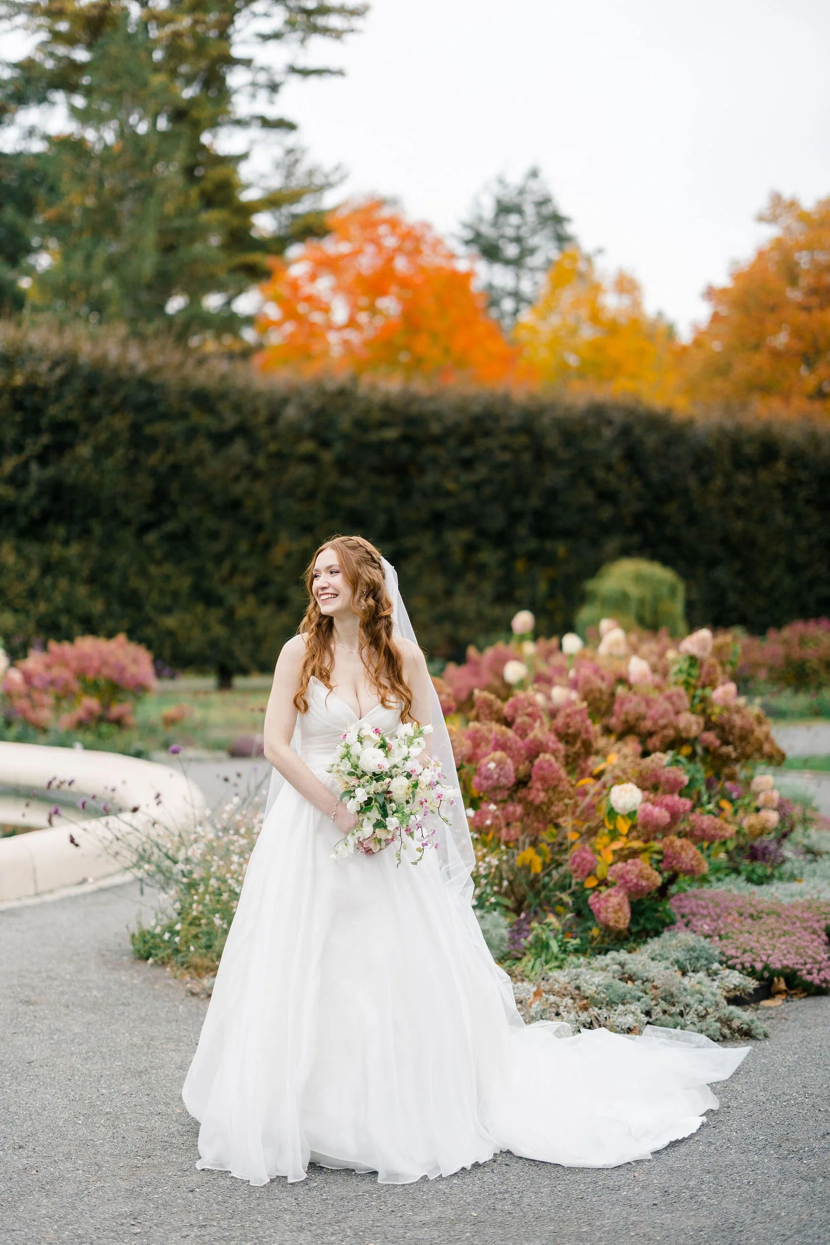 Romantic bridal portraits at an autumn wedding inspired by a secret garden.