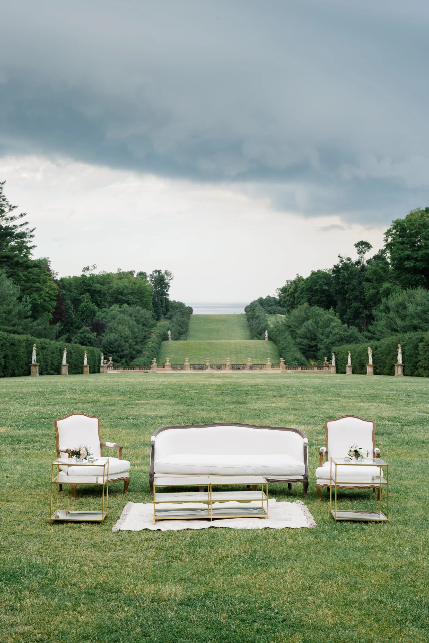Romantic summer cocktail hour at Castle Hill on the Crane Estate with sweeping views and vibrant celebration details.