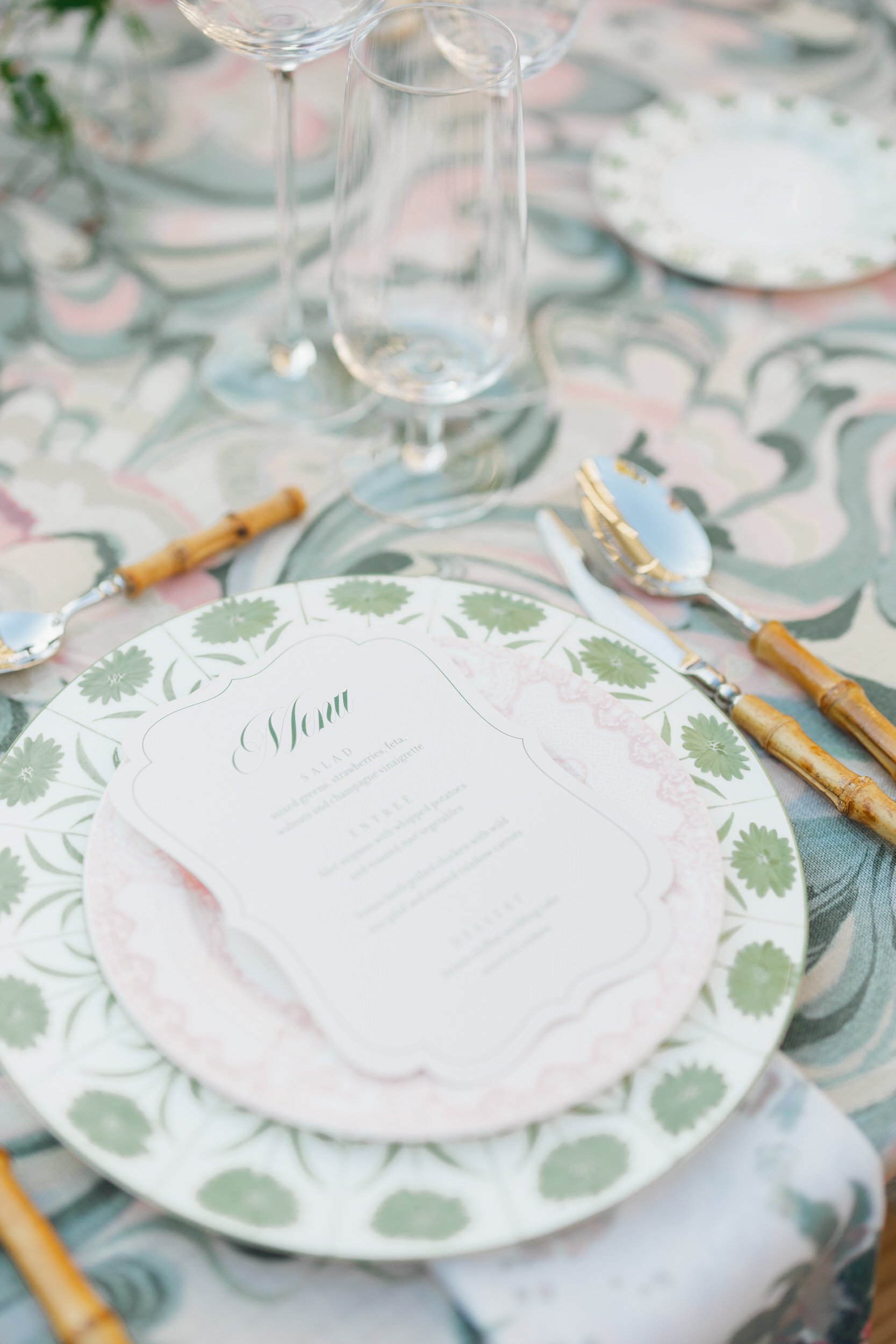 Wide view of reception tables and floral décor at The Gadsen House wedding.
