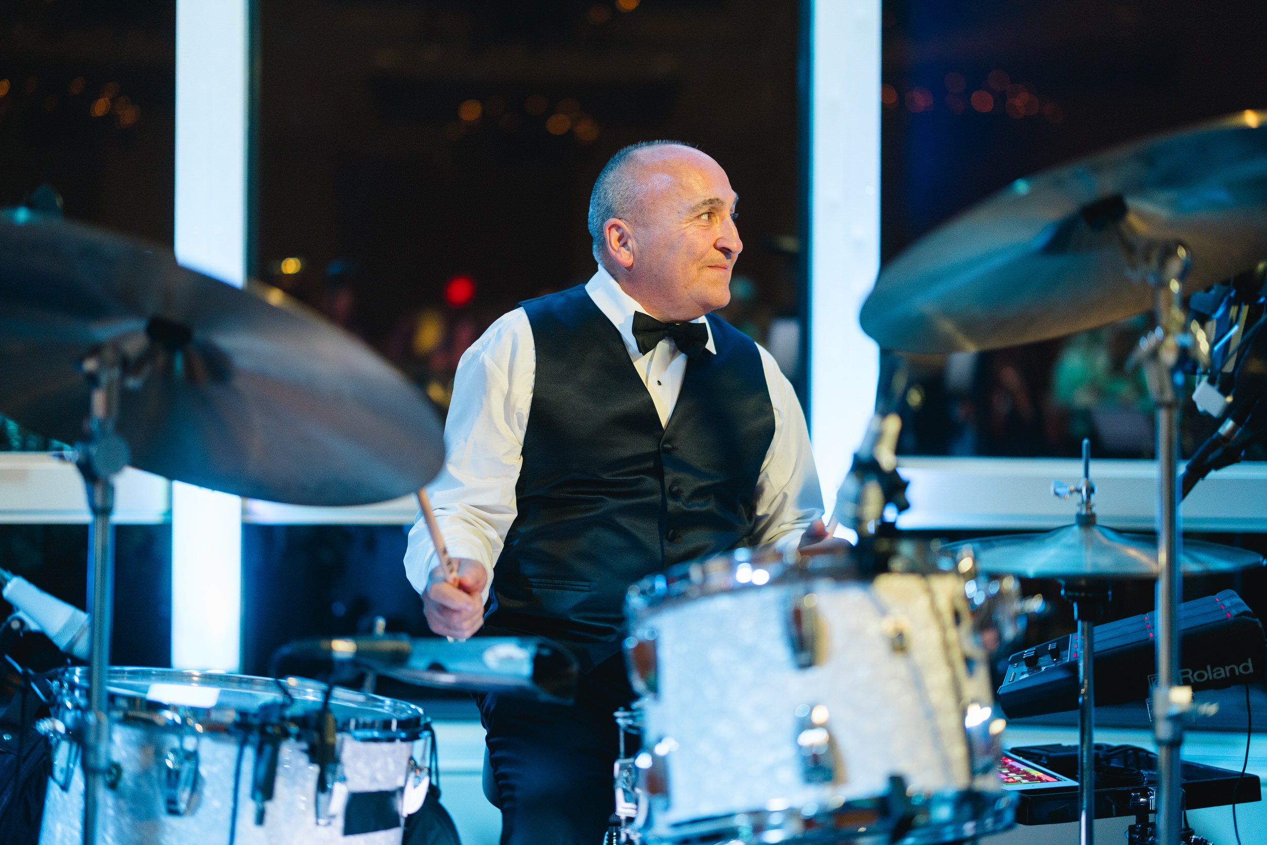 Lively wedding reception dancing in the Boston Harbor Hotel ballroom