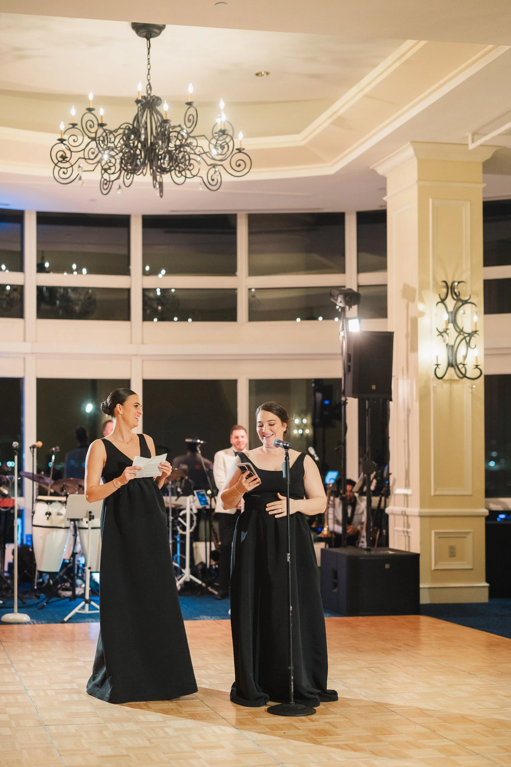 Documentary moments captured during wedding toasts at the Boston Harbor Hotel
