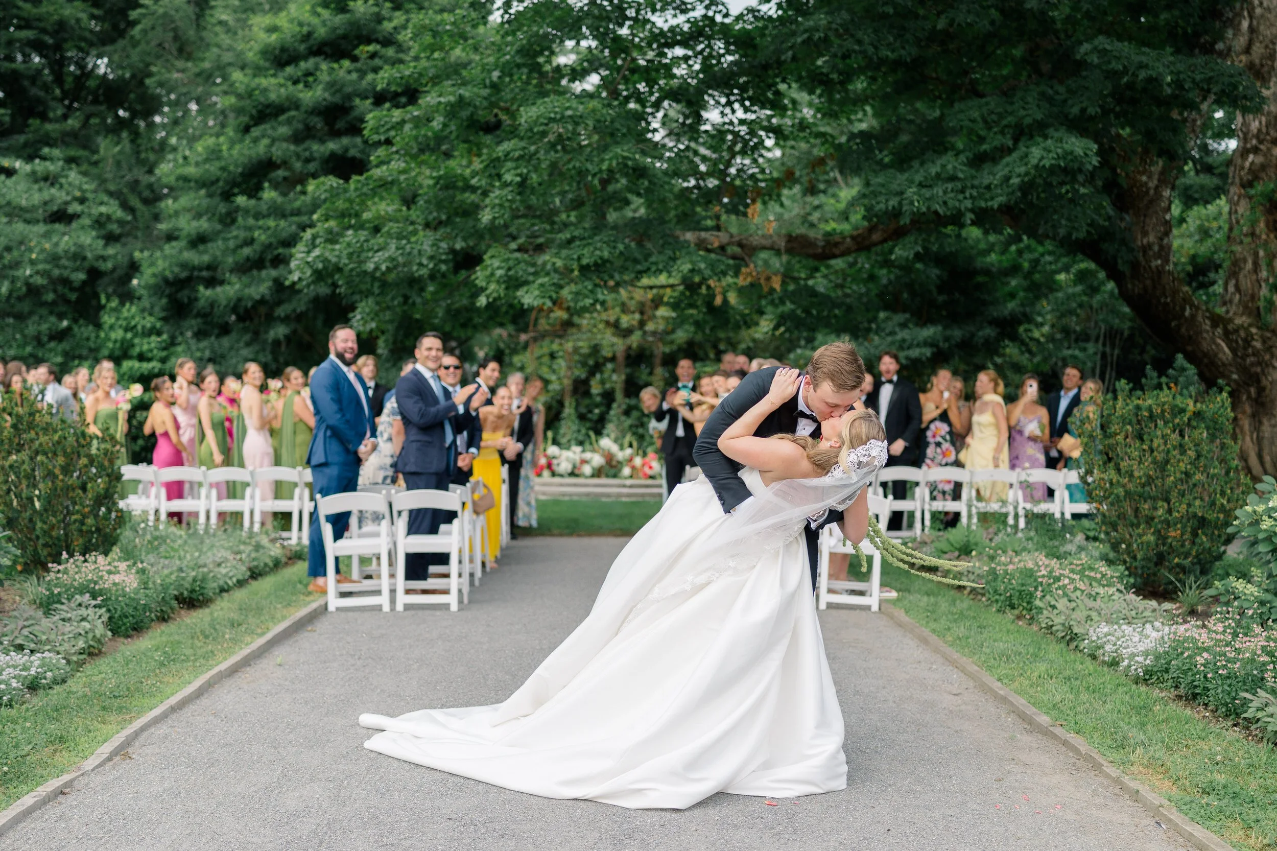 Newlyweds celebrating their marriage at a Massachusetts garden wedding