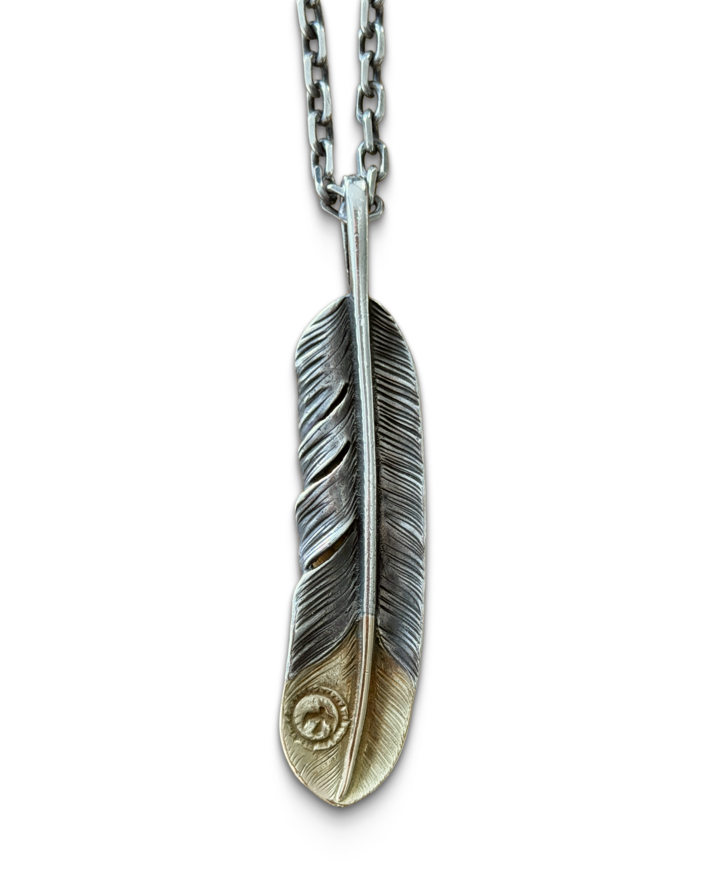 goros necklace feather.png