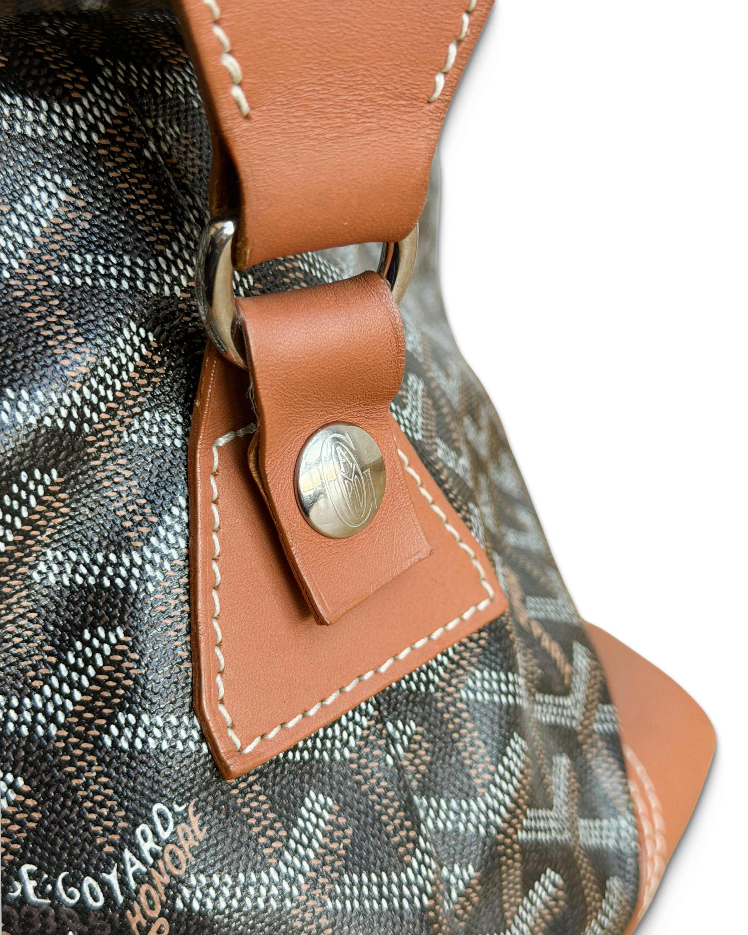 goyard brown boeing button closure.png