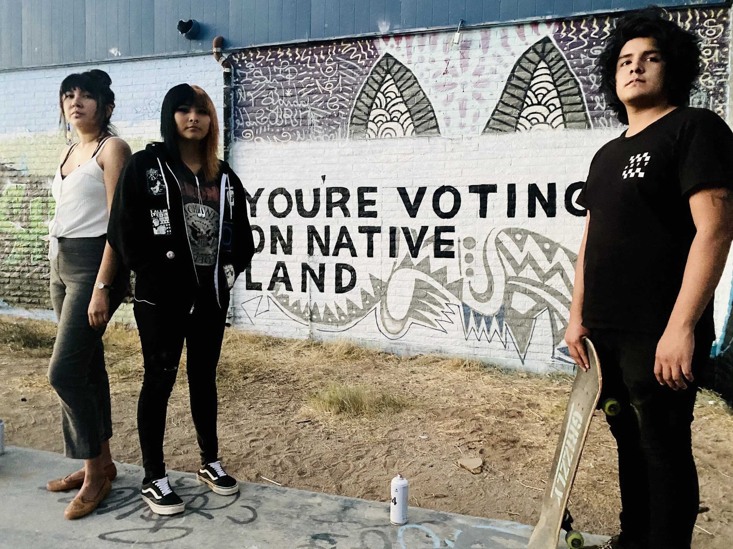    Portrait by Mural on the San Carlos Apache Reservation, Arizona   | Douglas Miles (IG: @dmiles1_apache) | Commissioned by Culture Surge 