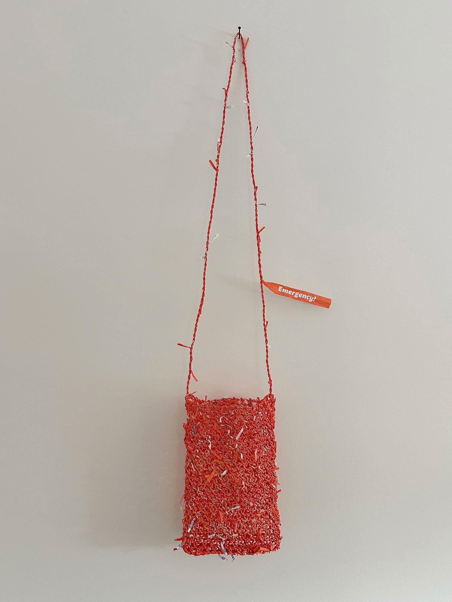 Slipping Through the Net, 2026 
Looping with handmade cordage with discarded Who Gives A Crap 'emergency' toilet roll paper wrappers, 70cm x 13cm x 8cm
