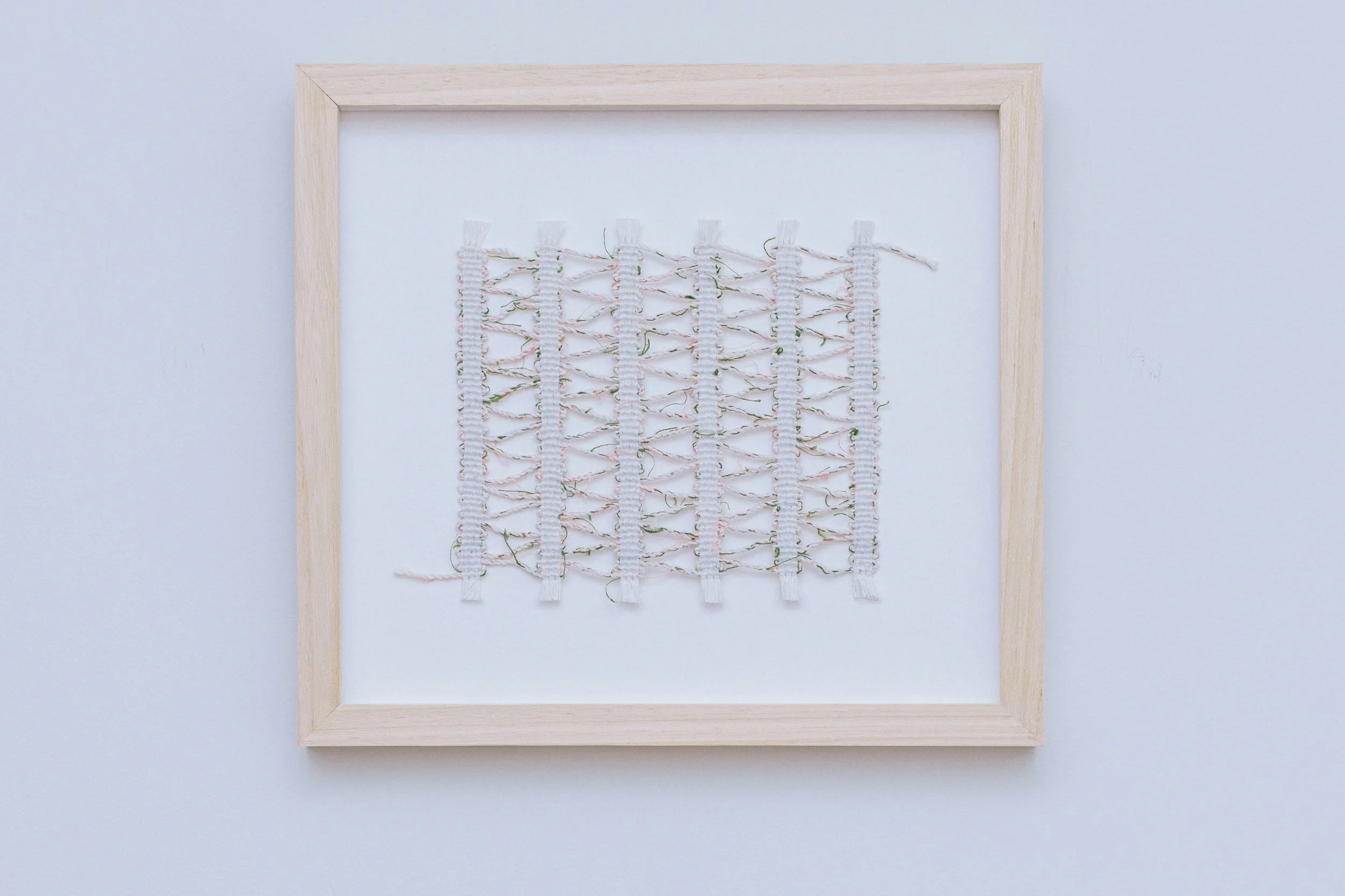 Warp Threads and Offcuts, Madder and Ivy, 2023 
Hand-woven textile with linen, cordage and natural dye, 27.5cm x 30cm (framed)