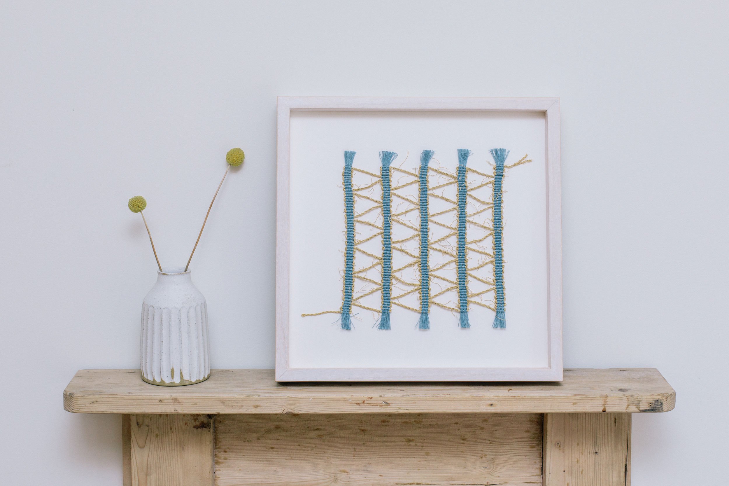 Repurpose III, 2021 
Hand-woven textile with linen, paper, cordage and natural dyes, 32cm x 32cm (framed)