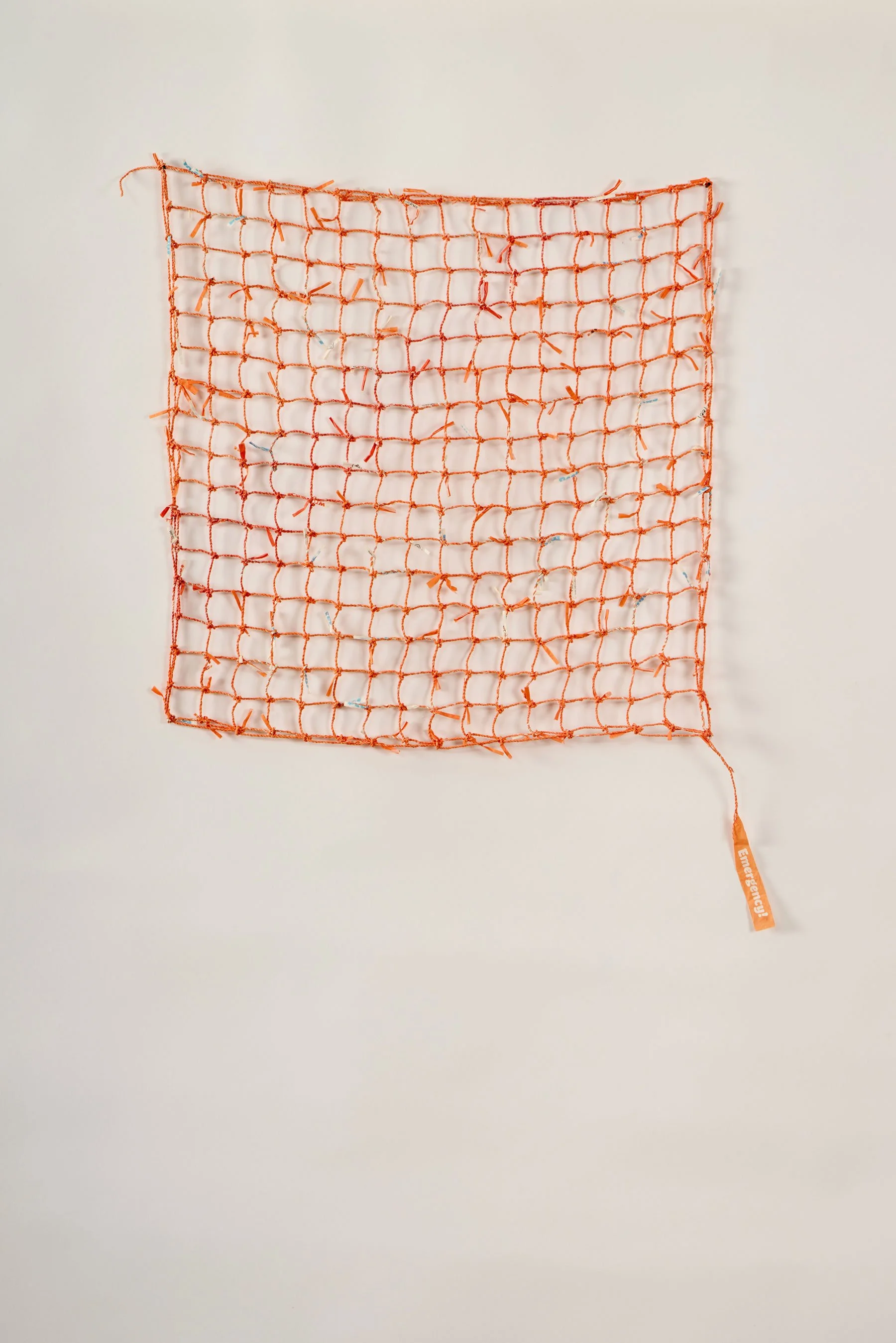 No Planet B, 2024 
Cordage and netting with discarded Who Gives A Crap 'emergency’ toilet roll paper wrappers, 42cm x 42cm