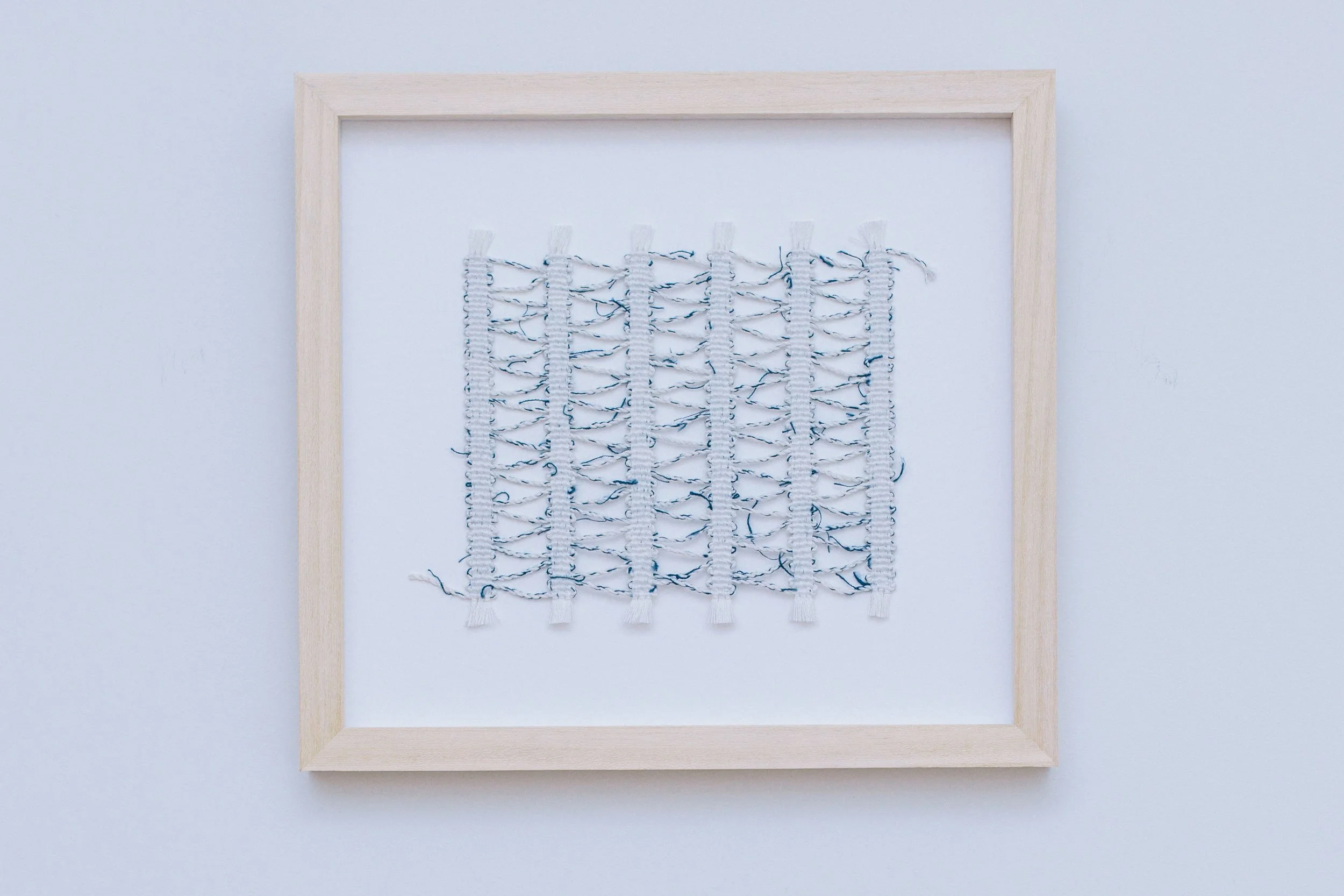 Warp Threads and Offcuts, Colbalt, 2023 
Hand-woven textile with linen and cordage, 27.5cm x 30cm (framed)