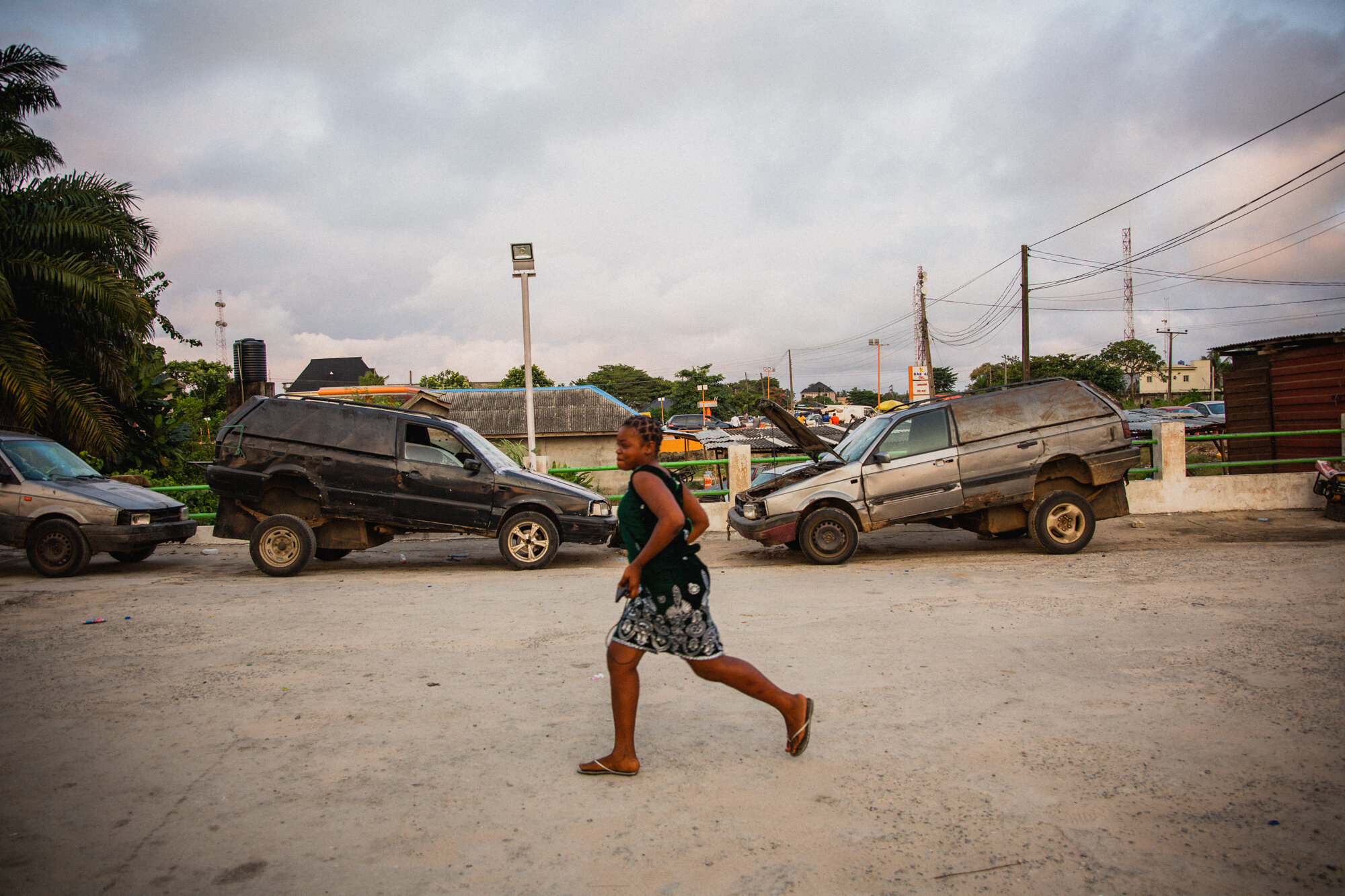 A passerby at the bus park