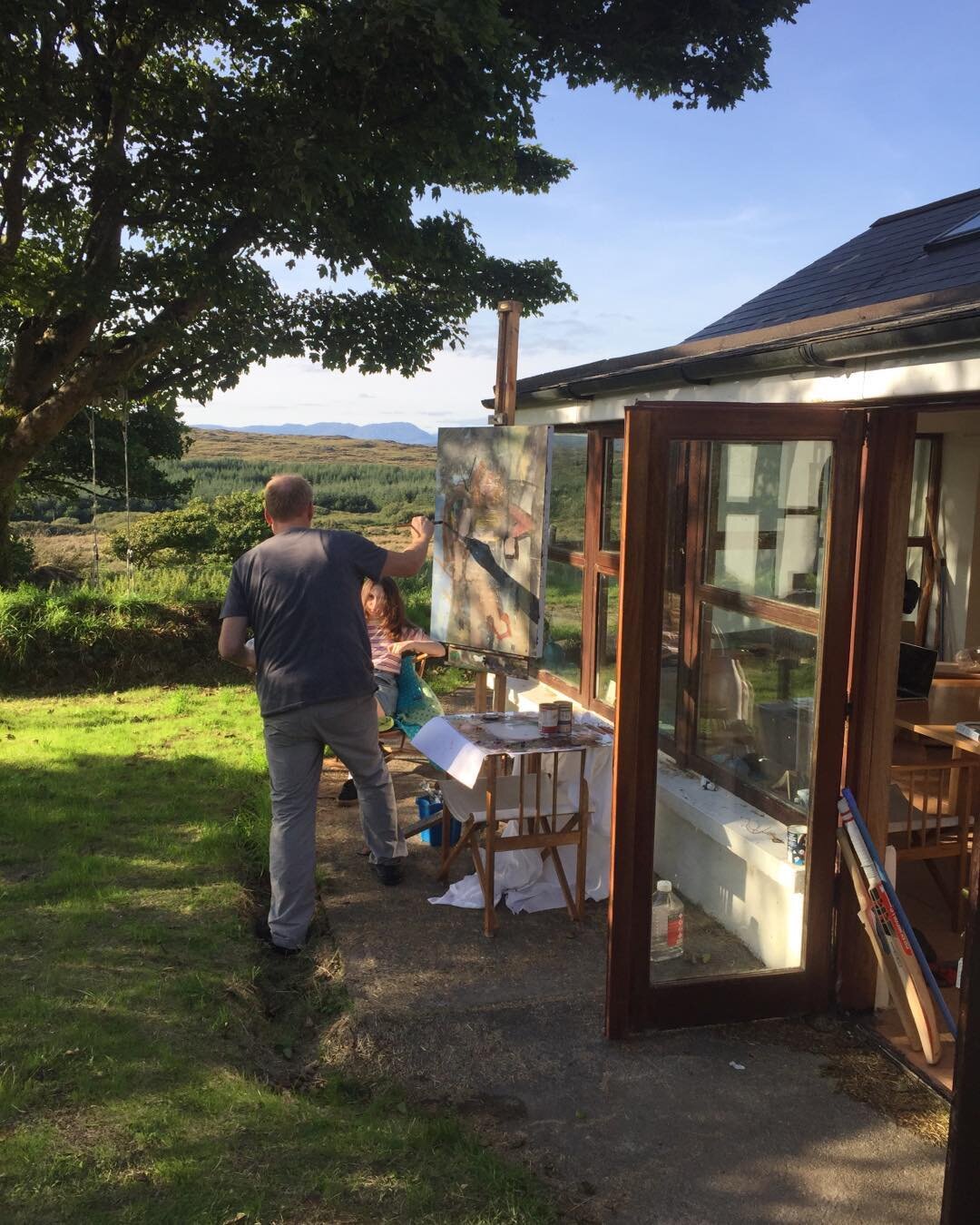 The brilliant artist Grant Wells earning his dinner capturing our first born in the perfect West Cork light #artistinresidence #grantwells #portrait #light #ireland #summer18 #painting #daughter