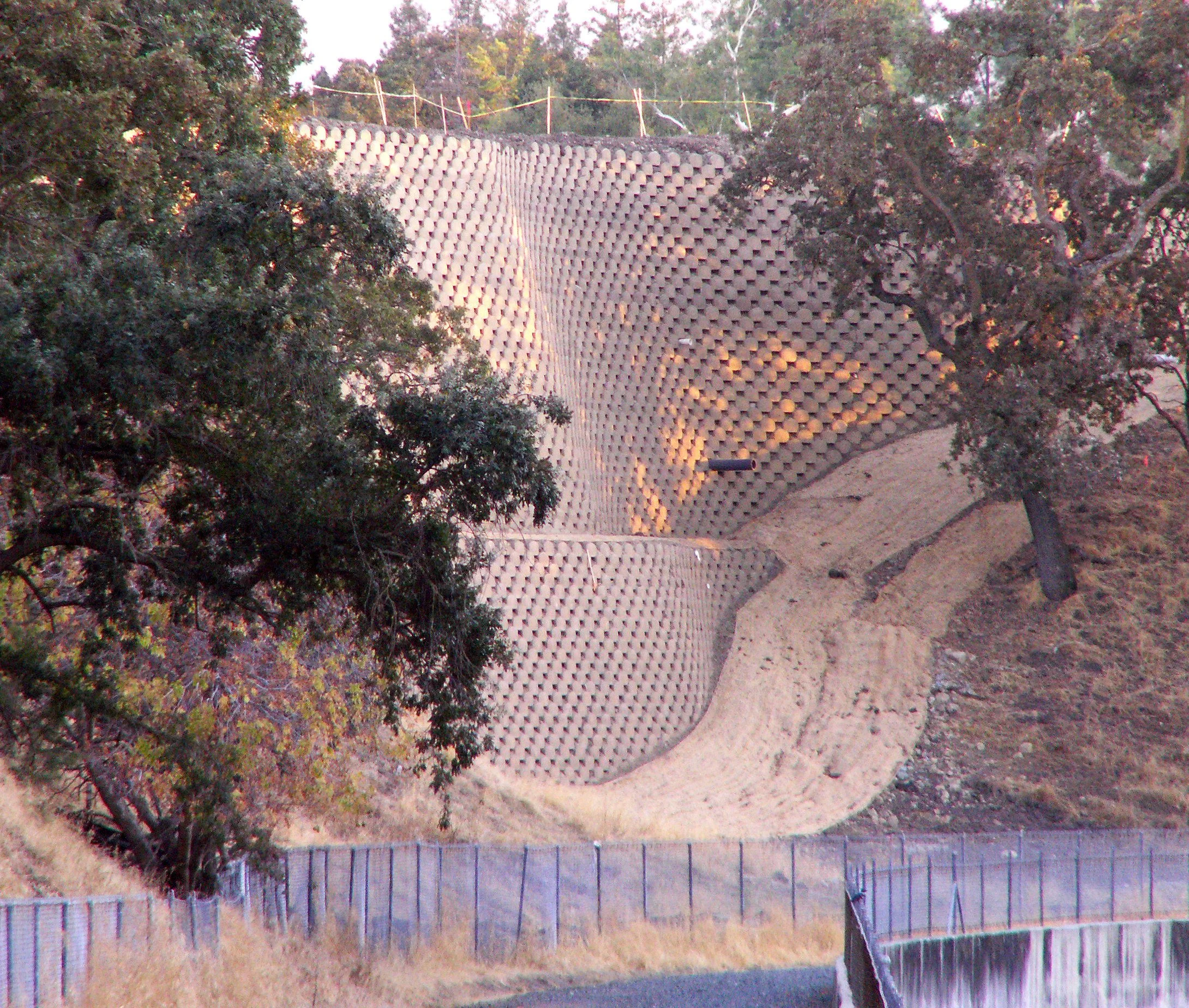 THE REALITY: Mostly FLAT - 38 foot high retaining walls. Lots of fill! SE, along Walnut Creek channel