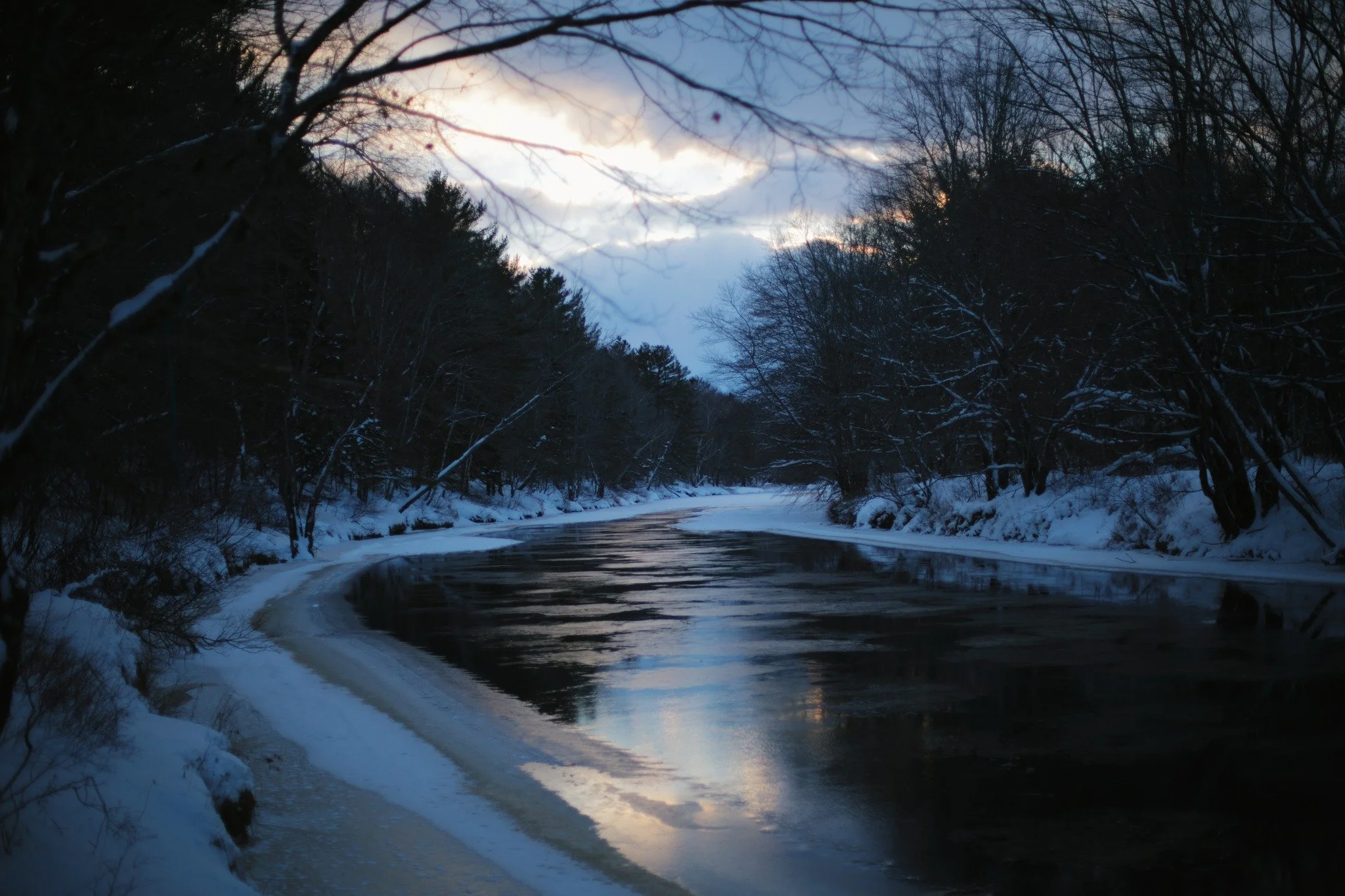 SIGHING WELCOME &mdash;&mdash; Watching ice overtake the river always feels like the coldest possible sight. More so somehow than actually frozen over, it's the knowledge of that open water being colder than it has a right. Add to that the bad attitu