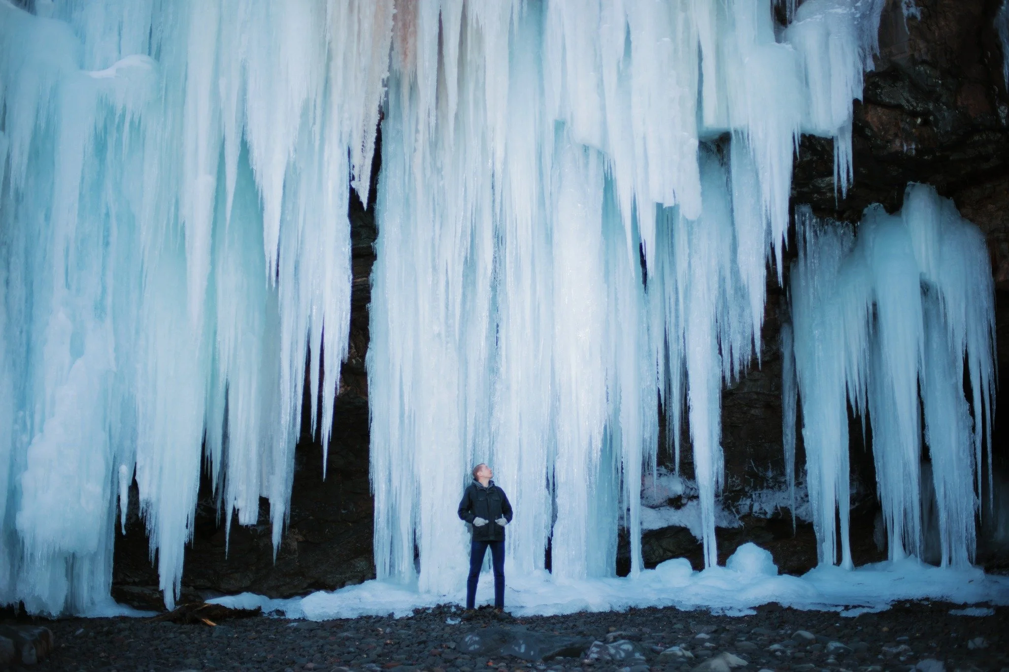 WHITE FLAG WAVER

the rounded rocks
of Fundy beaches
are hardly a welcoming walk
I trip and twist my way along
marking time to the tidal clock
between craggy cliffs
and icicles crashing
the sound of winter rundown ringing
what I'm bringing to the sul