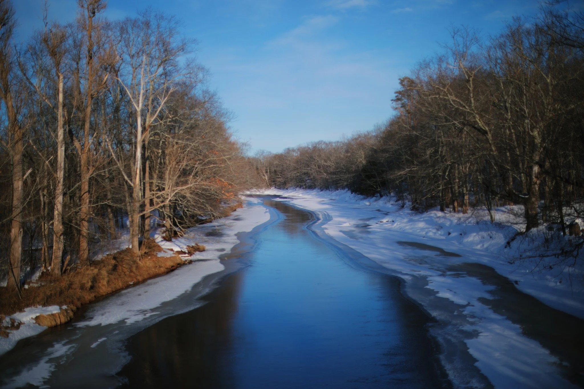 WAKING RESTLESS &mdash;&mdash; The north banks melt first. That's always the story of a east-west river in Canada, catching slightly more sunlight on one side. Spring comes asymmetrically; winter ends uneasily. The great change-over is hardly happeni