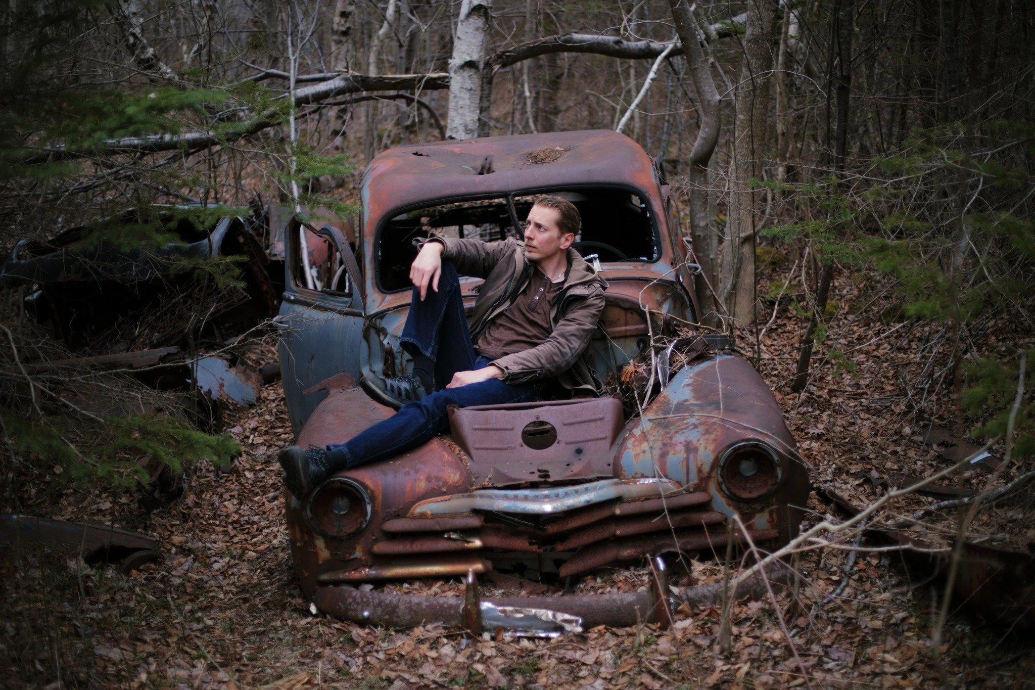 WAY CLEAR &mdash;&mdash; How many lives can one wreck have? I'm sure it's been here longer than it was ever on the road, nearest field fenced off and trees like prison bars surrounding. Big dent on the roof might've been from some trunk falling, or a