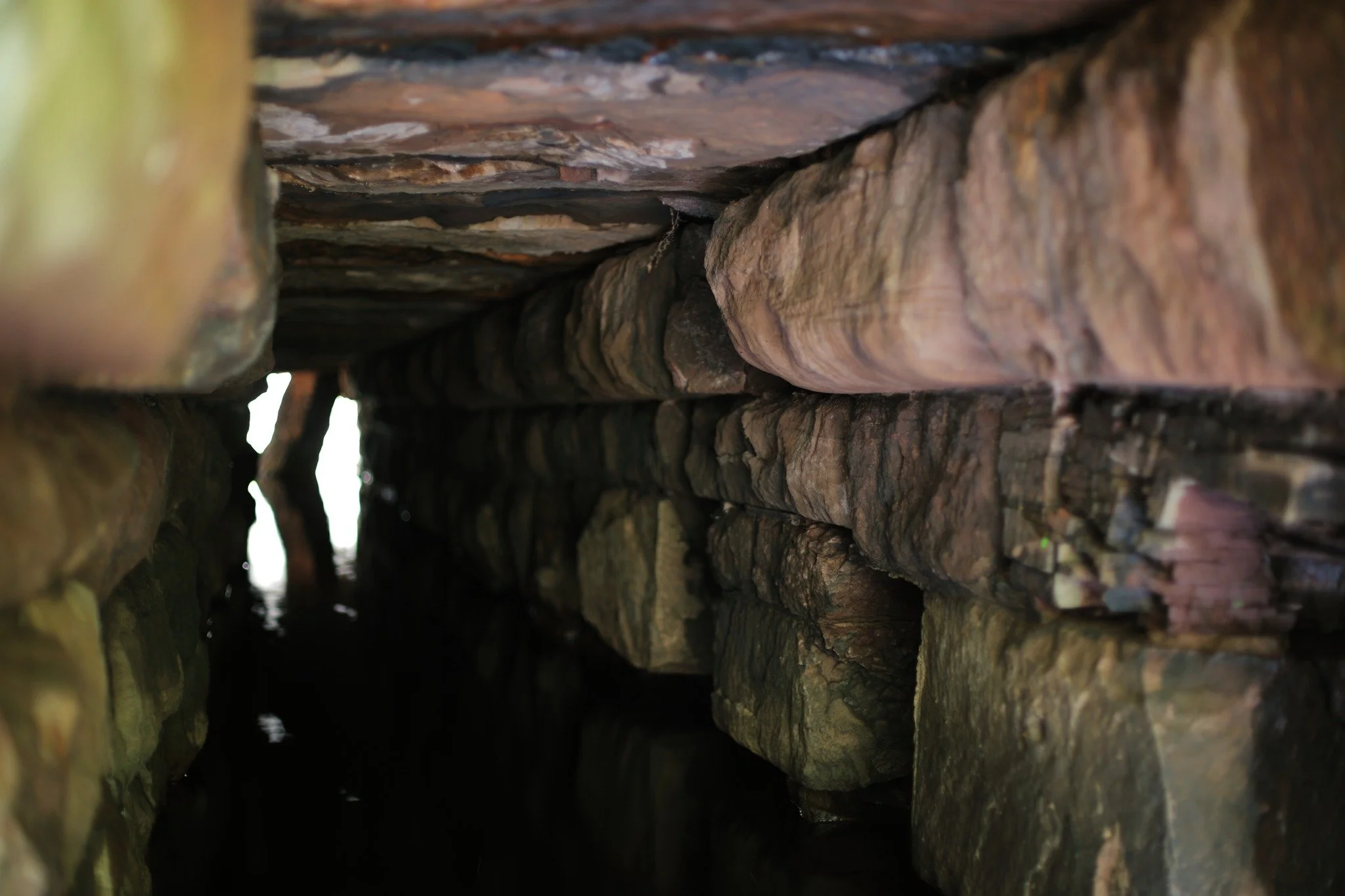 CAN'T EVER CLAW &mdash;&mdash; Sometime in the lead-up to 1901, these blocks were laid for the Midland Railway Company. They've been holding up the railbed ever since. Sandstone, I suppose, carrying a lot on their shoulders &mdash; though no tracks o