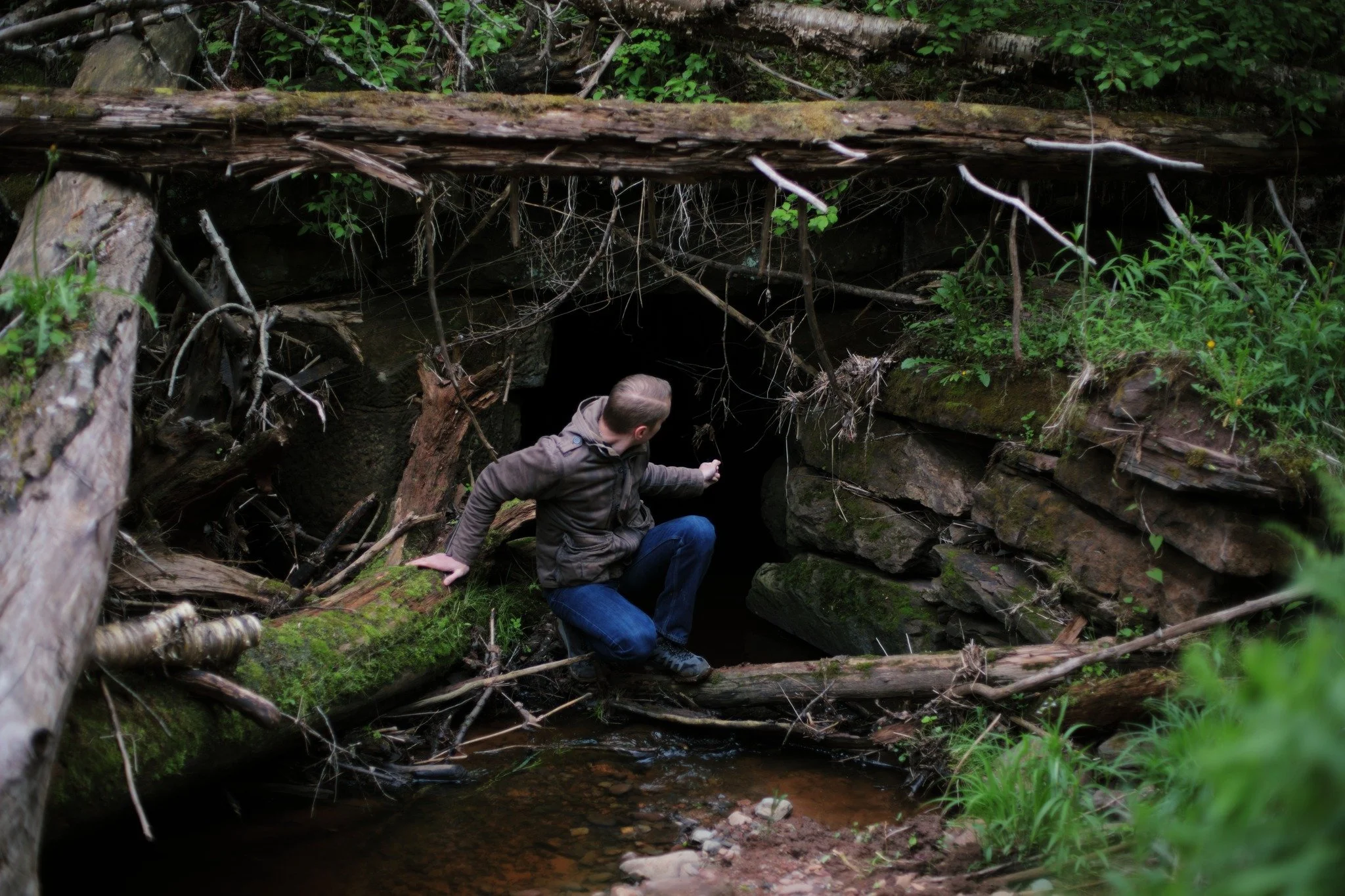 WORLD FROM FALLING &mdash;&mdash; This abandoned railway culvert is a good way down the line to its age of ignorance, and seems to be left for an eventual collapse. This side doesn't look so bad, but upstream is always more durable. It's the force of