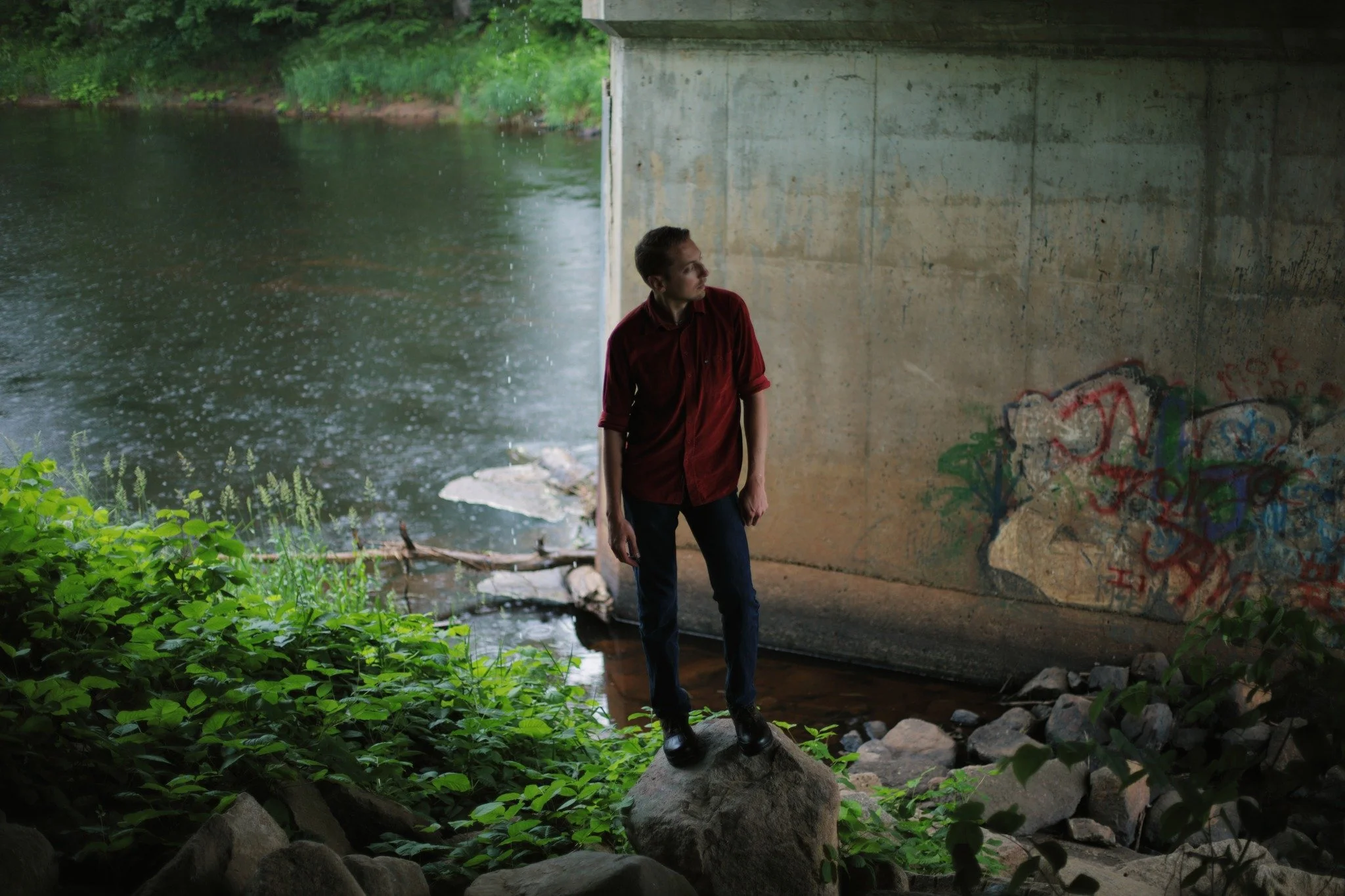 NO ONE NOTICES &mdash;&mdash; Down under the concrete bridge in a pouring rain. I can't think of much more peaceful than this. There's a strange sort of calm that settles, protected from the storm outside, rattling raindrops in Annapolis riverwater. 