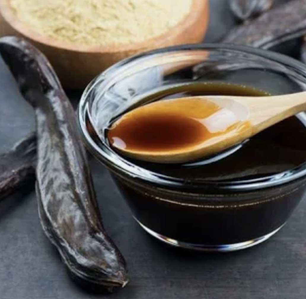 Carob with spoon and pod.jpg