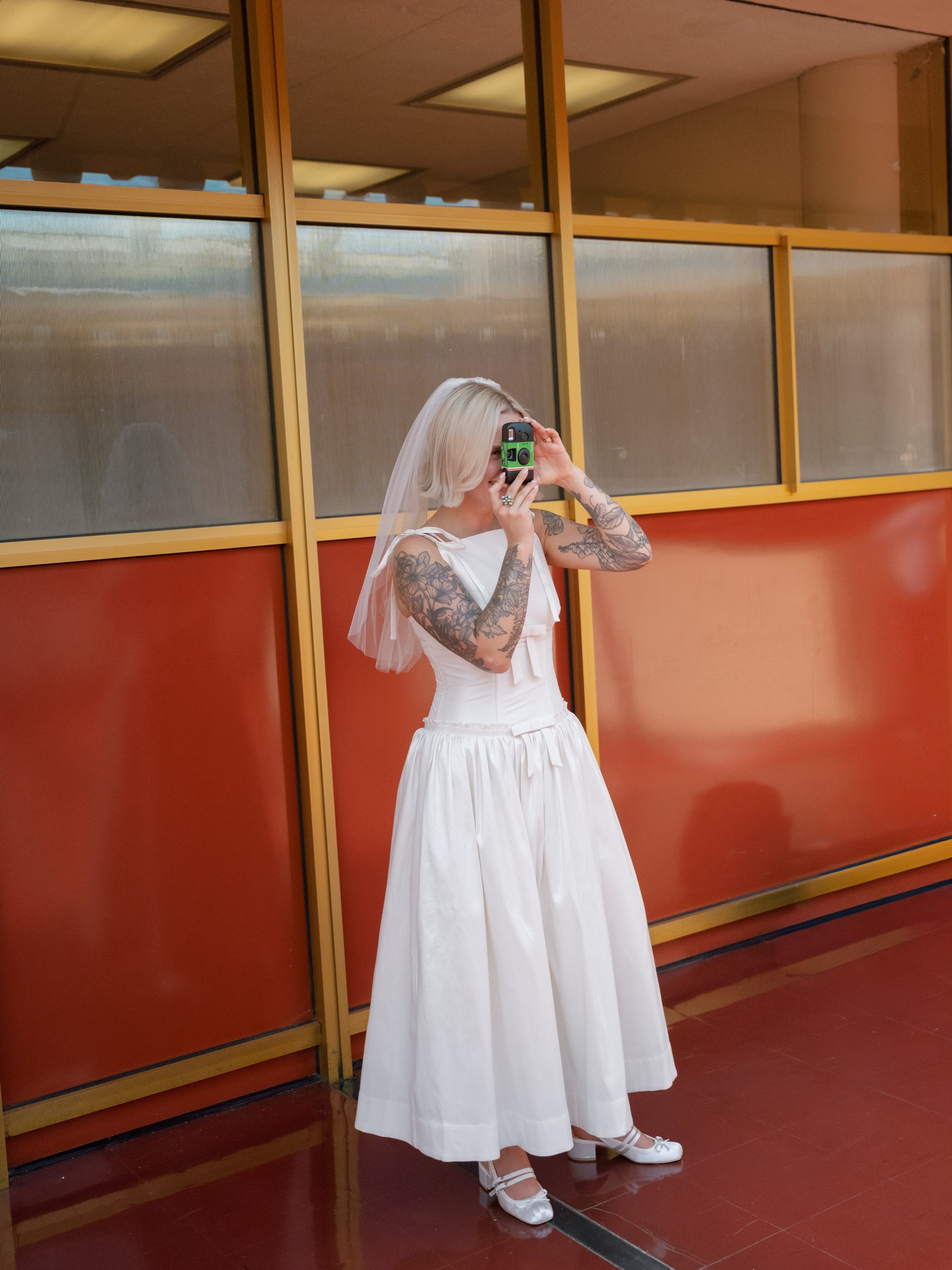 Mostly film for Jeremy &amp; Jordyn&rsquo;s Marin Civic Center elopement 🎞️

There&rsquo;s something about the colors, architecture, and light at the Civic Center that feels made for film. The warm tones, soft grain, and little shifts in color just 