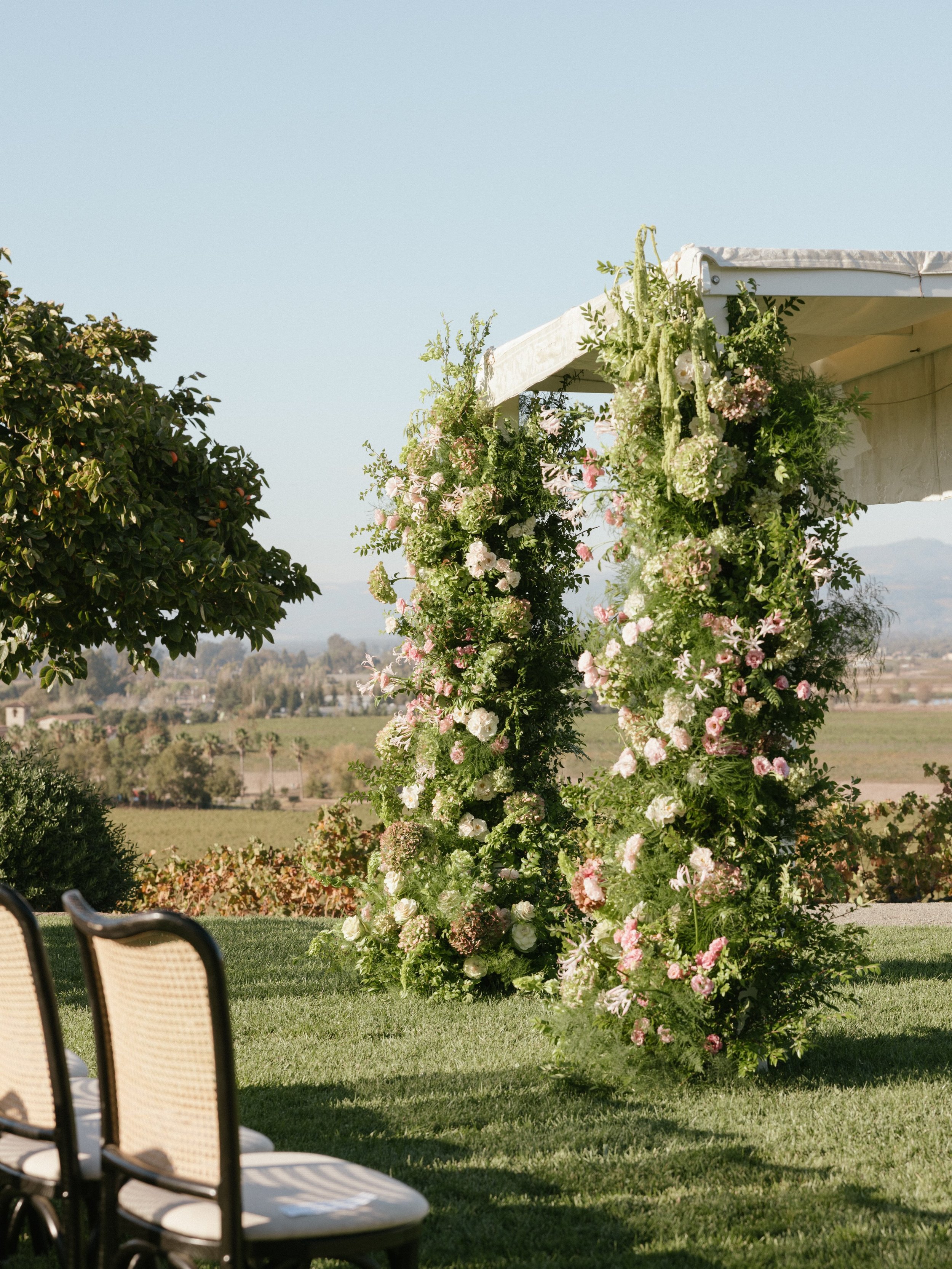 A chuppah with a view 🌿🌸

Besides being absolutely stunning, Allie &amp; Alex&rsquo;s chuppah was made from the wedding dress of the groom&rsquo;s mom and grandmother. Such a special, meaningful detail. 🤍

 Planning: @quintanaevents
Venue: @viansa
