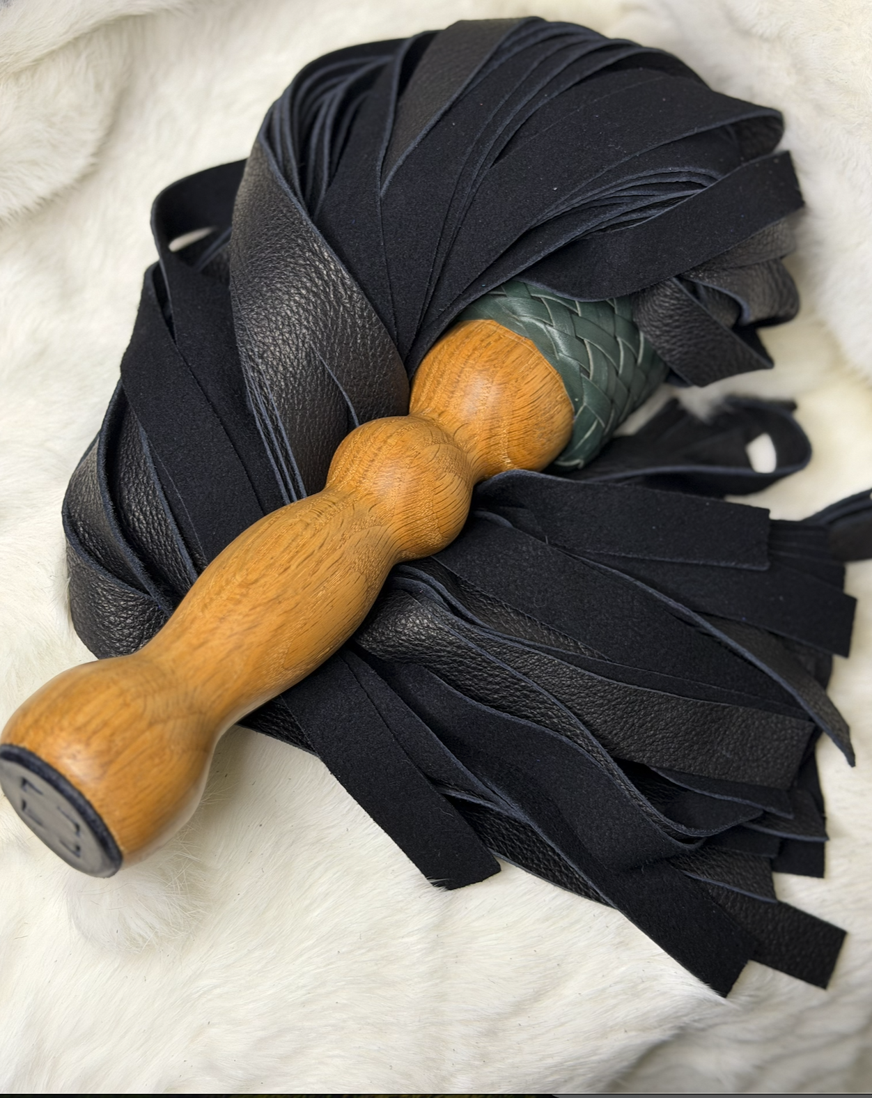 Elk Hide with Exotic East Indian Ebony Handle Flogger