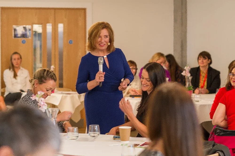 Maureen McCowen using humour while speaking at a workshop
