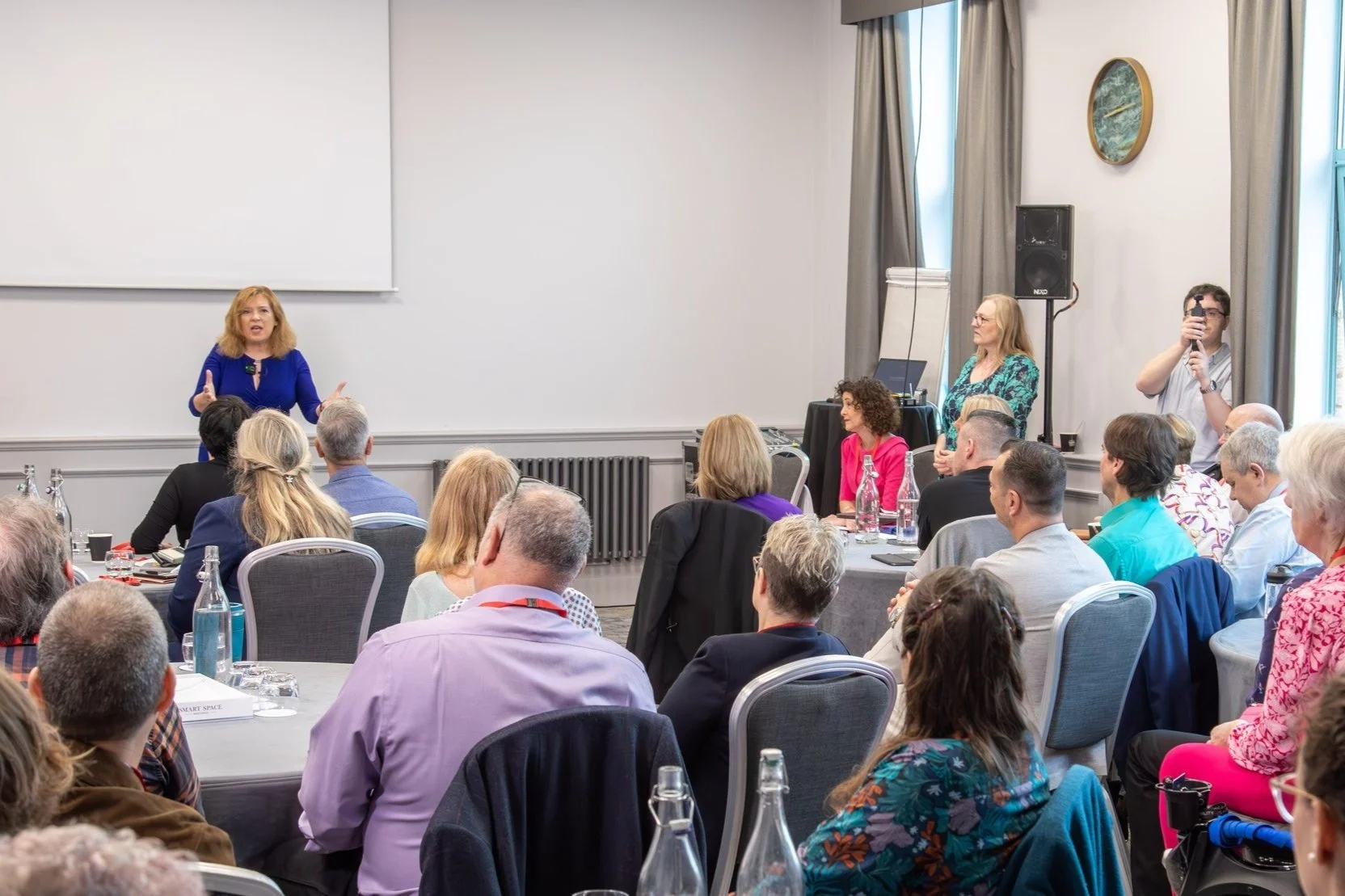 Maureen McCowen presenting at a conference.