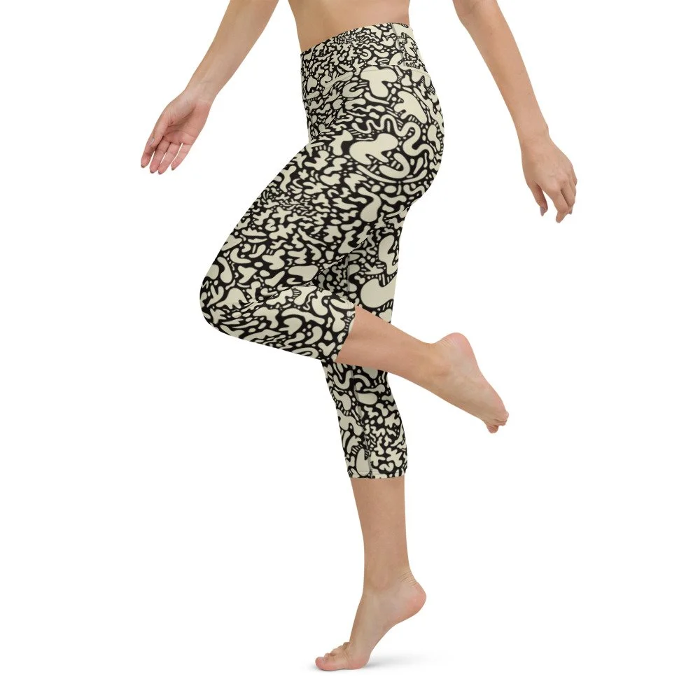 all-over-print-yoga-capri-leggings-white-left-61e477b609f4a.jpg