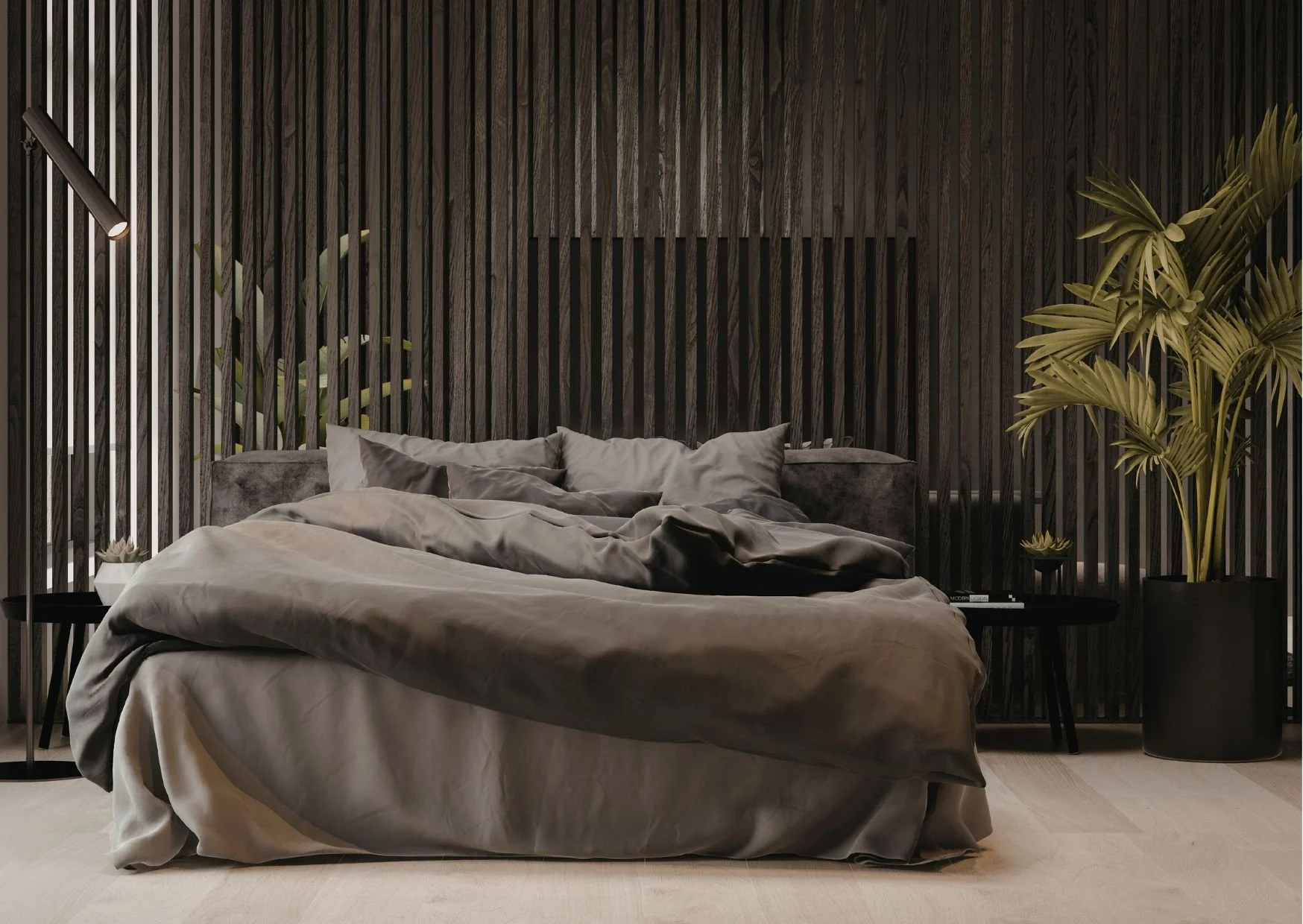 Spacious hotel-inspired bedroom with wooden platform bed, sitting area, marble flooring, ceiling fan, and elegant neutral palette.