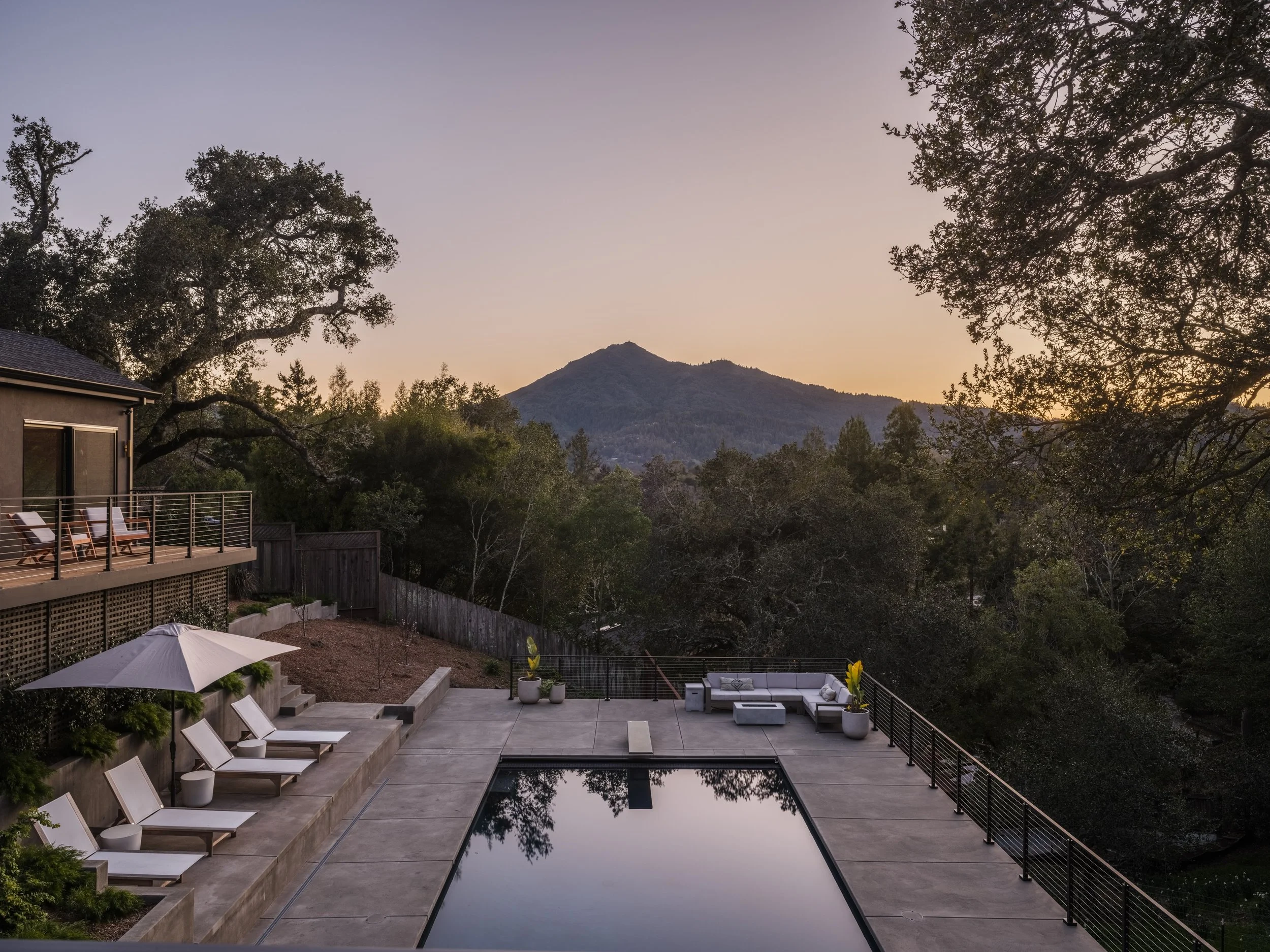 Outdoor patio design showcasing a comfortable and elegant backyard seating area