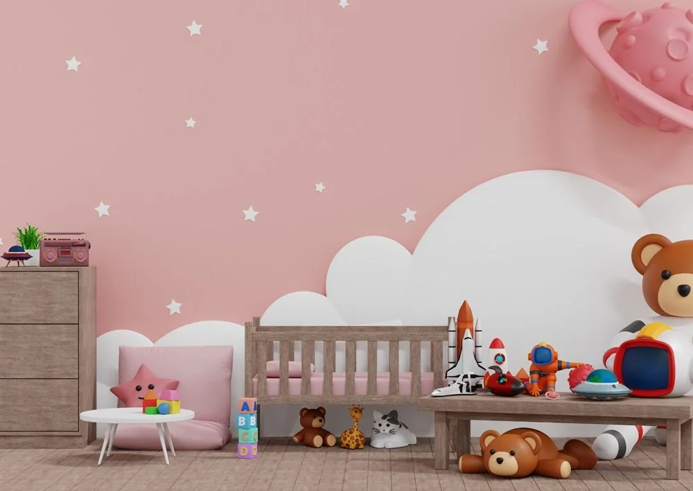 Pink cloud playroom with teddy toys, low furniture, and a whimsical wall mural.