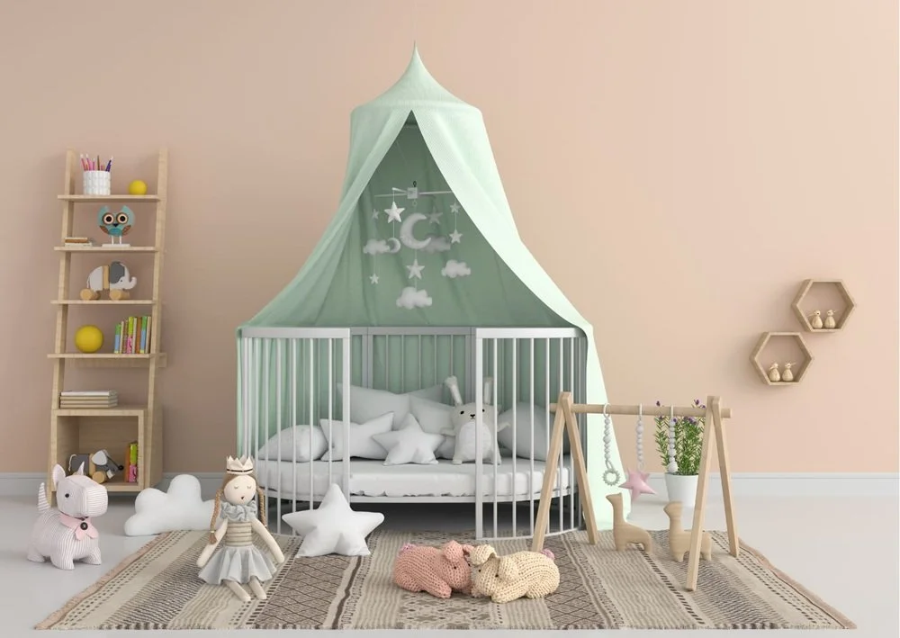 Mint canopy nursery with stars, soft rug, toys, and gentle pastel accents.