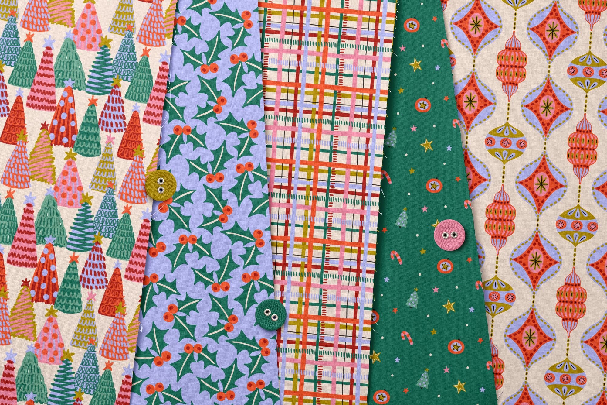 Jolly & Bright fabric collection: stacked fabrics with hand painted Christmas trees, holly, plaid and ornament prints in pink, emerald, lavender and mustard, copyright Sandra Hutter.