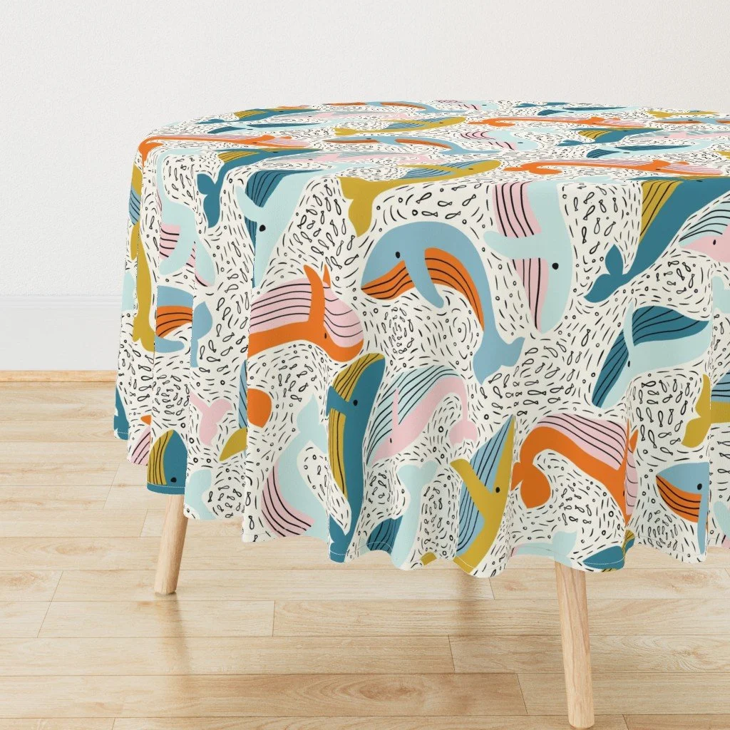 Round tablecloth featuring the pattern Happy Whales - Playful Ocean Animals for Kids