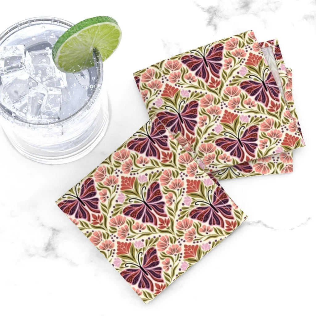Cocktail napkins with plum butterflies and coral folk flowers in a mirrored damask on cream, copyright Sandra Hutter.