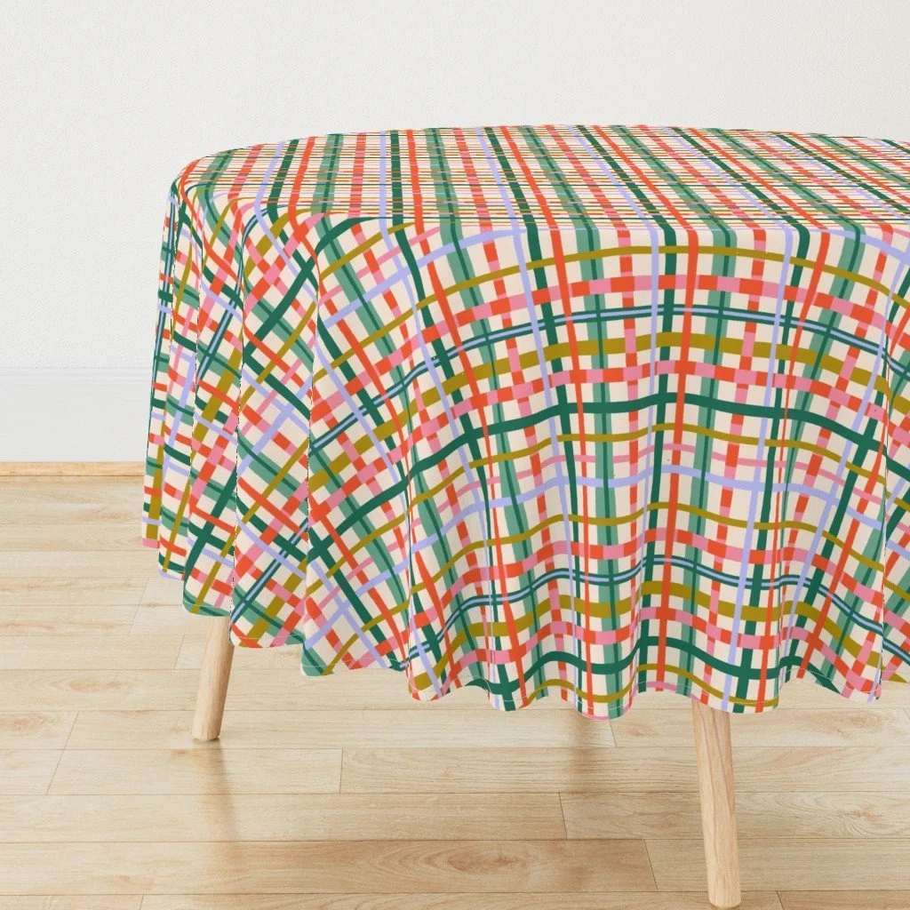 Jolly & Bright: Painted Christmas Plaid in Pink and Mustard on a tablecloth by Spoonflower, copyright Sandra Hutter.