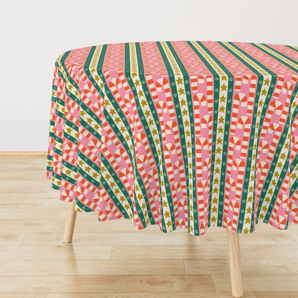 Jolly & Bright: Candy Cane Stripe in Pink and Emerald on a tablecloth by Spoonflower, copyright Sandra Hutter.