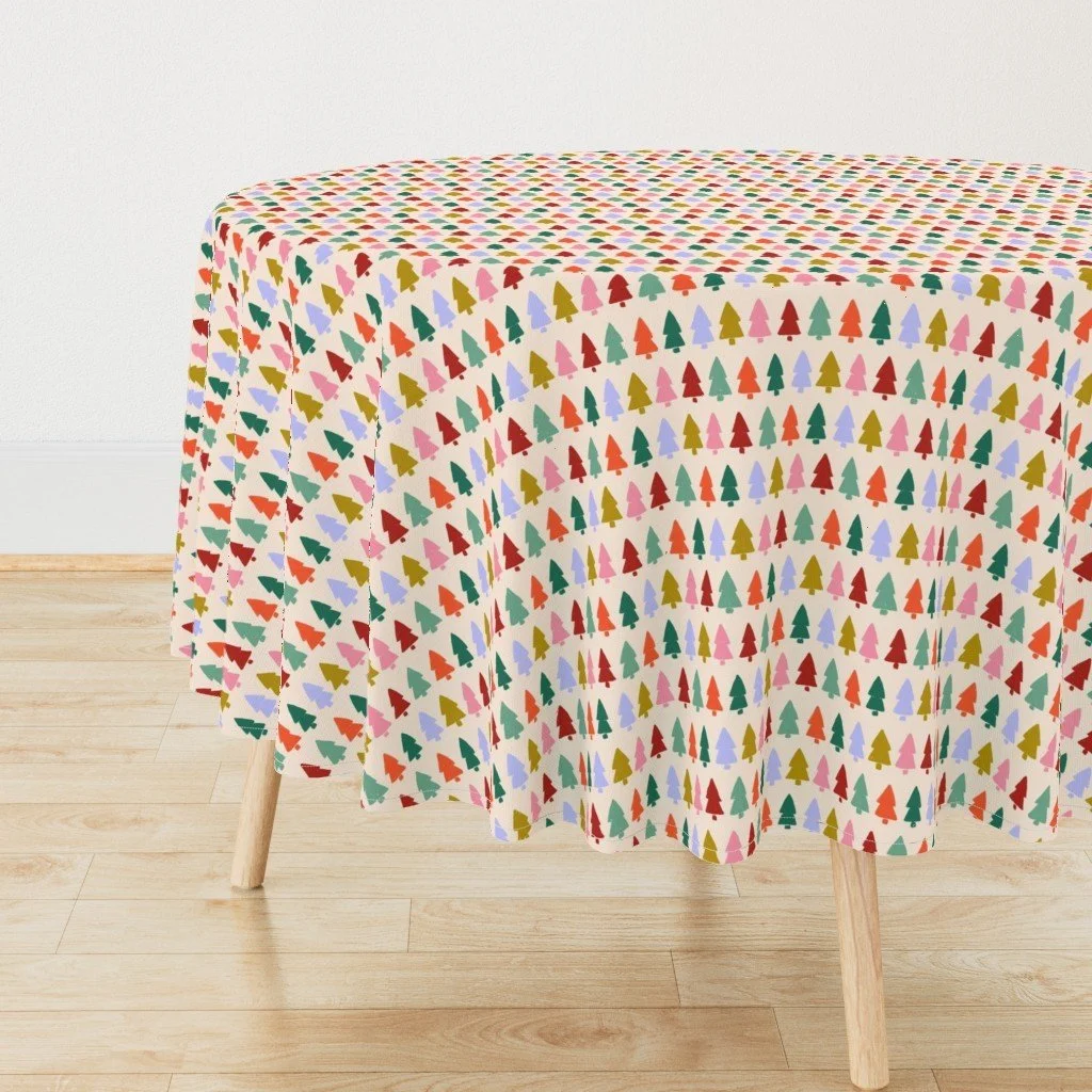 Jolly & Bright: Christmas Tree Rows in Candy Colors on Cream on a tablecloth by Spoonflower, copyright Sandra Hutter.