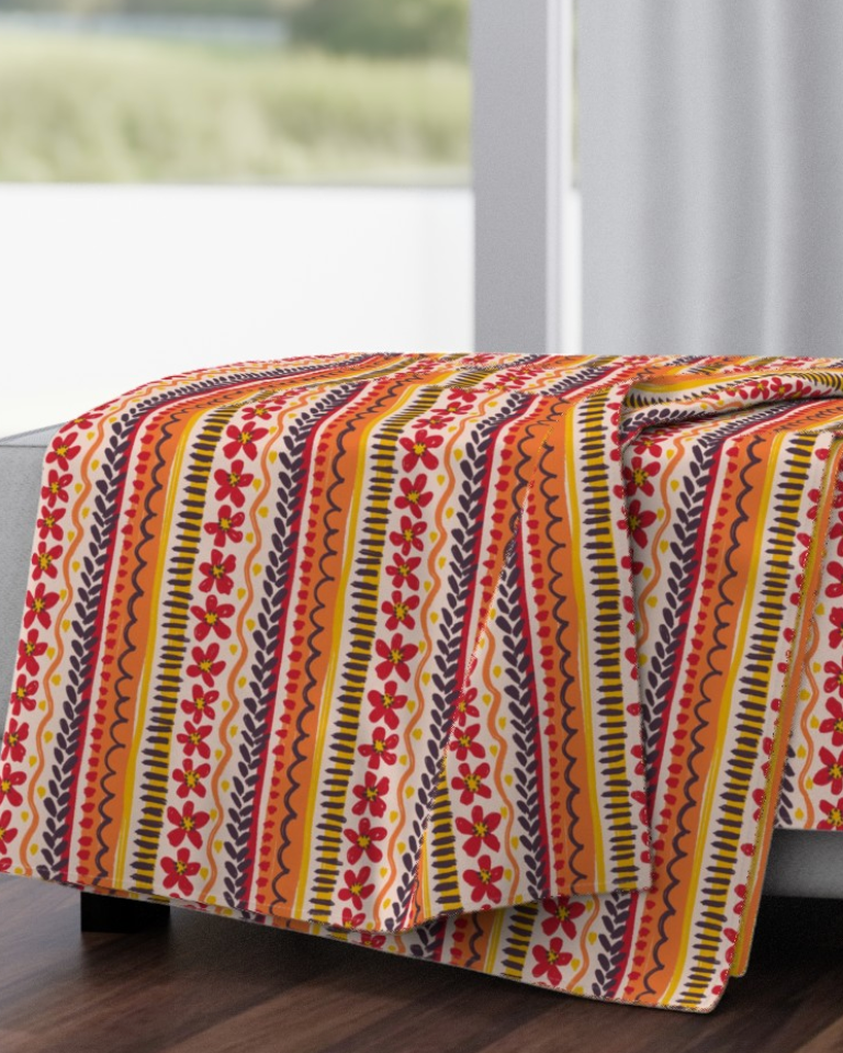 red-and-orange-folk-embroidery-stripe-medium-throw-blanket-mockup.png